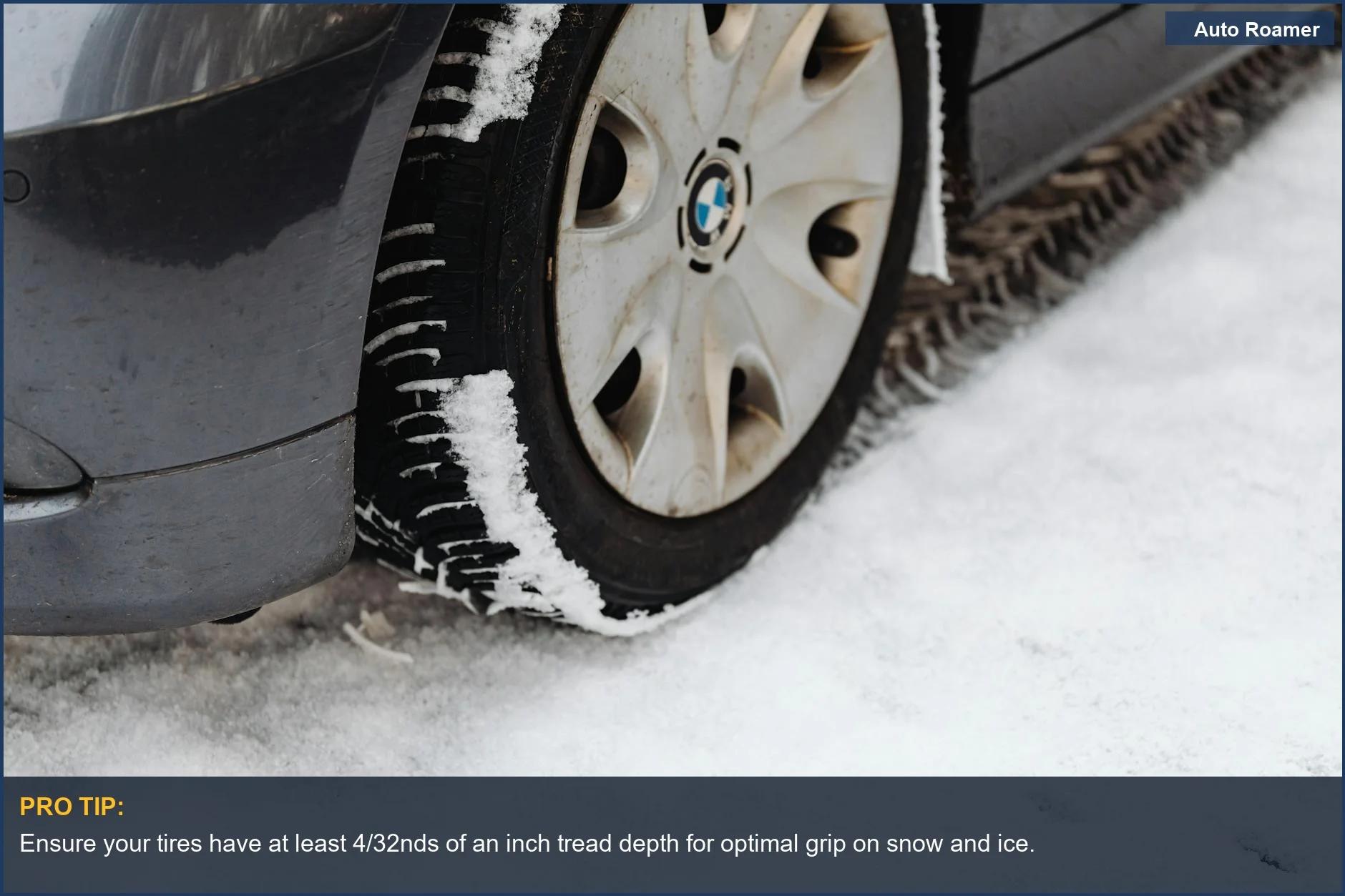Close-up of a car tire on a snowy road, crucial for winter road trip safety.