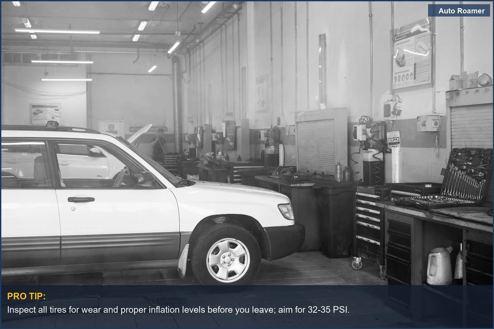 Car in garage with tools, emphasizing car maintenance tips for a smooth road trip.