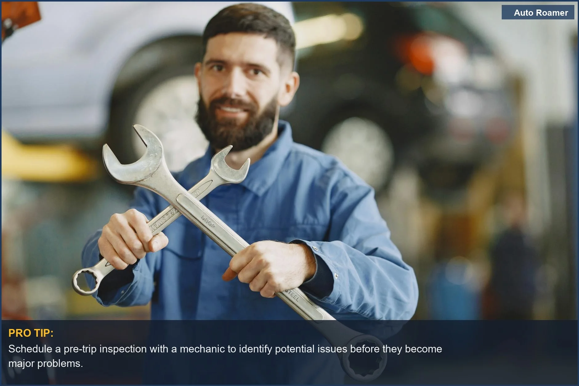 Mechanic with wrenches in auto repair shop, illustrating proactive car problem prevention.