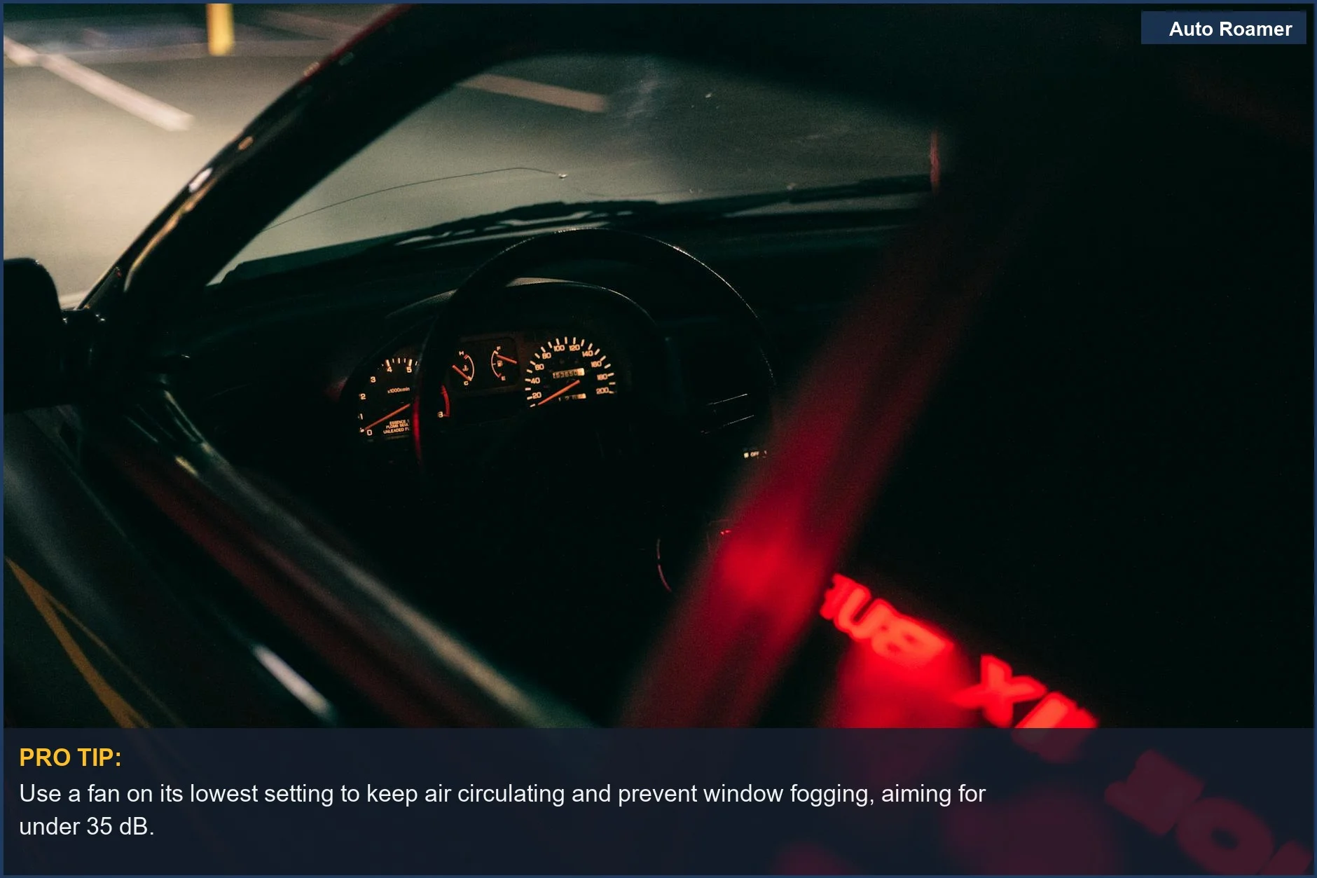 Dimly lit car interior at night, demonstrating how a quiet fan can prevent condensation for better sleep comfort.