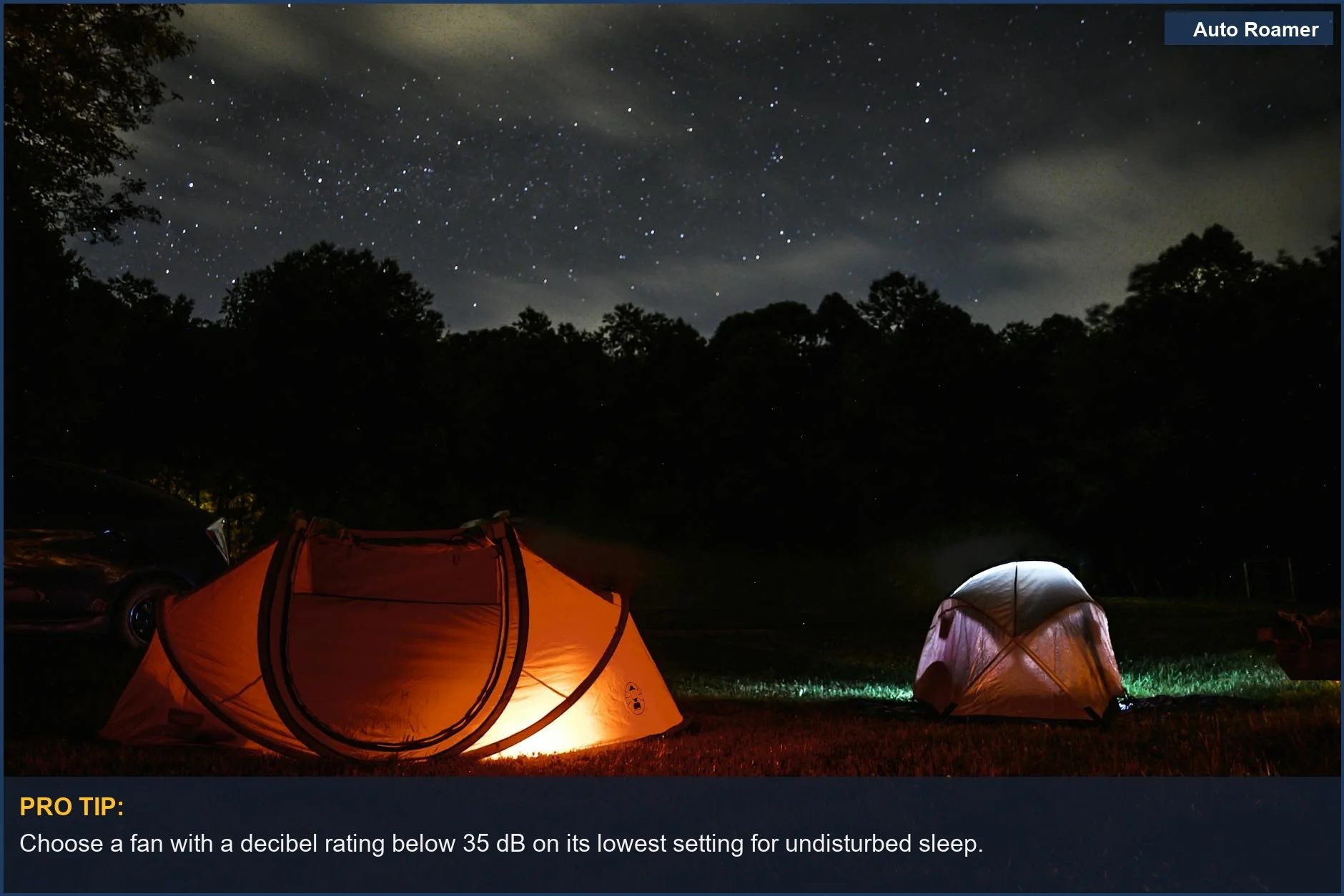 Serene night camping scene with glowing tents under stars, emphasizing the importance of a low noise level fan.
