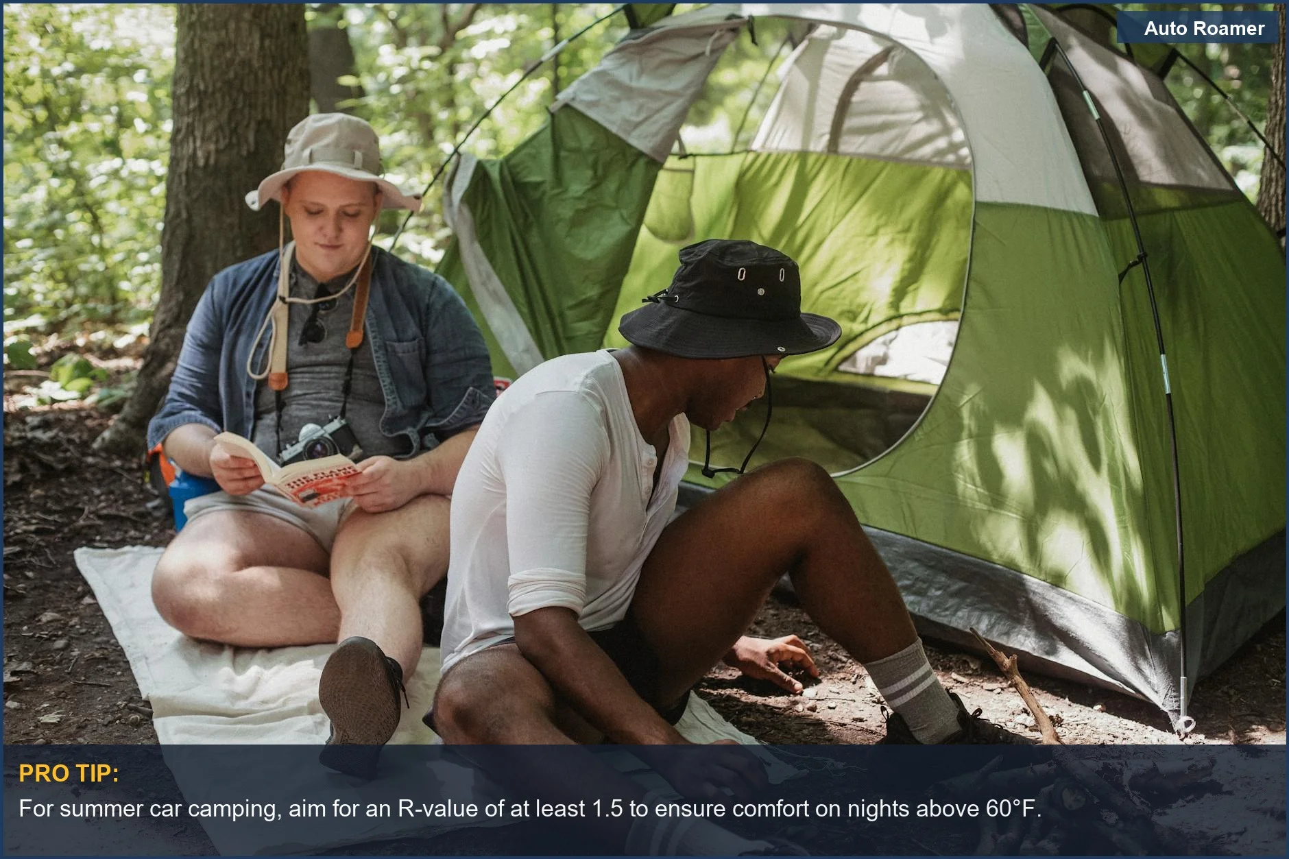 Man reading near tent with friend, highlighting basic sleeping pad R-value for summer trips.