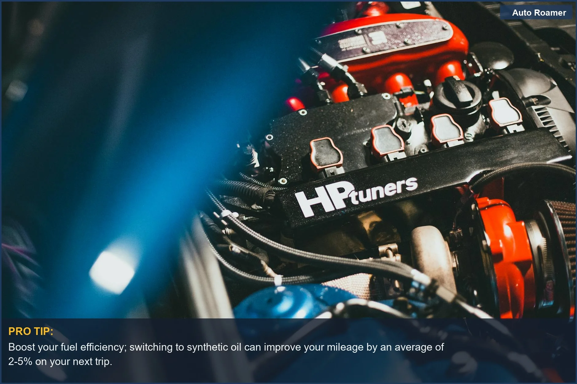 Dynamic shot of a high-performance car engine with HP Tuners branding, showcasing the benefits of synthetic oil for fuel efficiency.
