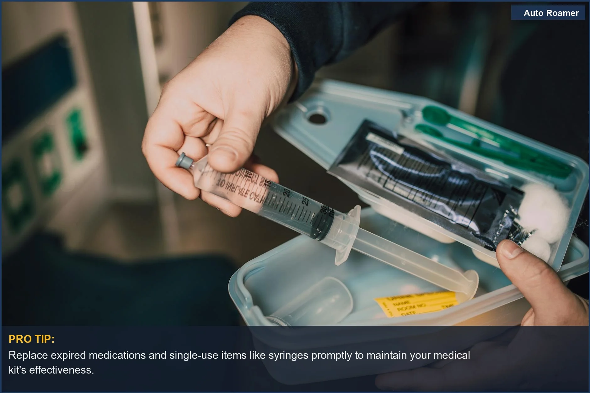 Close-up of a hand holding a syringe from a medical kit, emphasizing maintaining a medical kit.