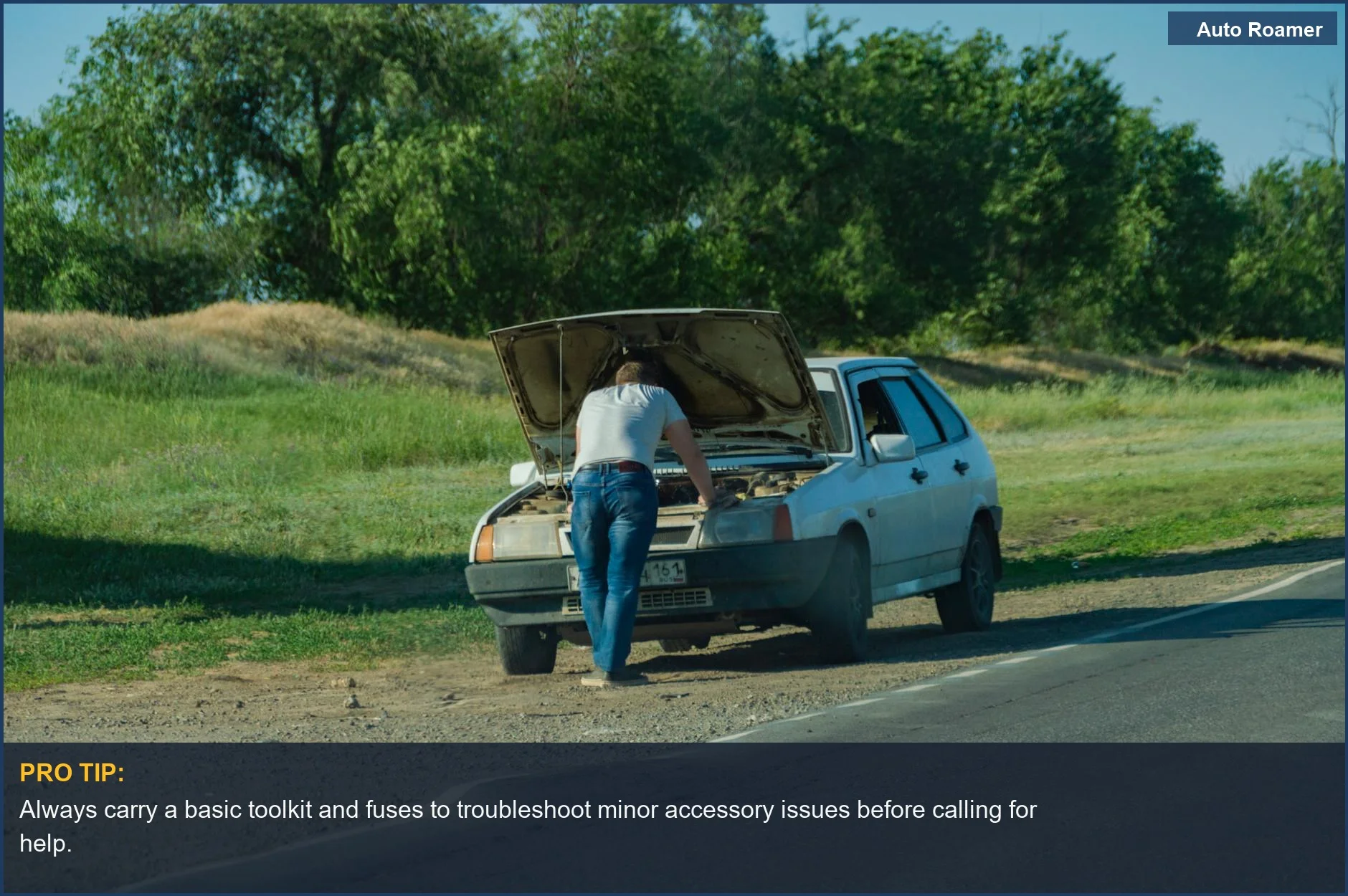 Man by car on roadside, examining a breakdown, emphasizing preparedness for accessory-related failures.