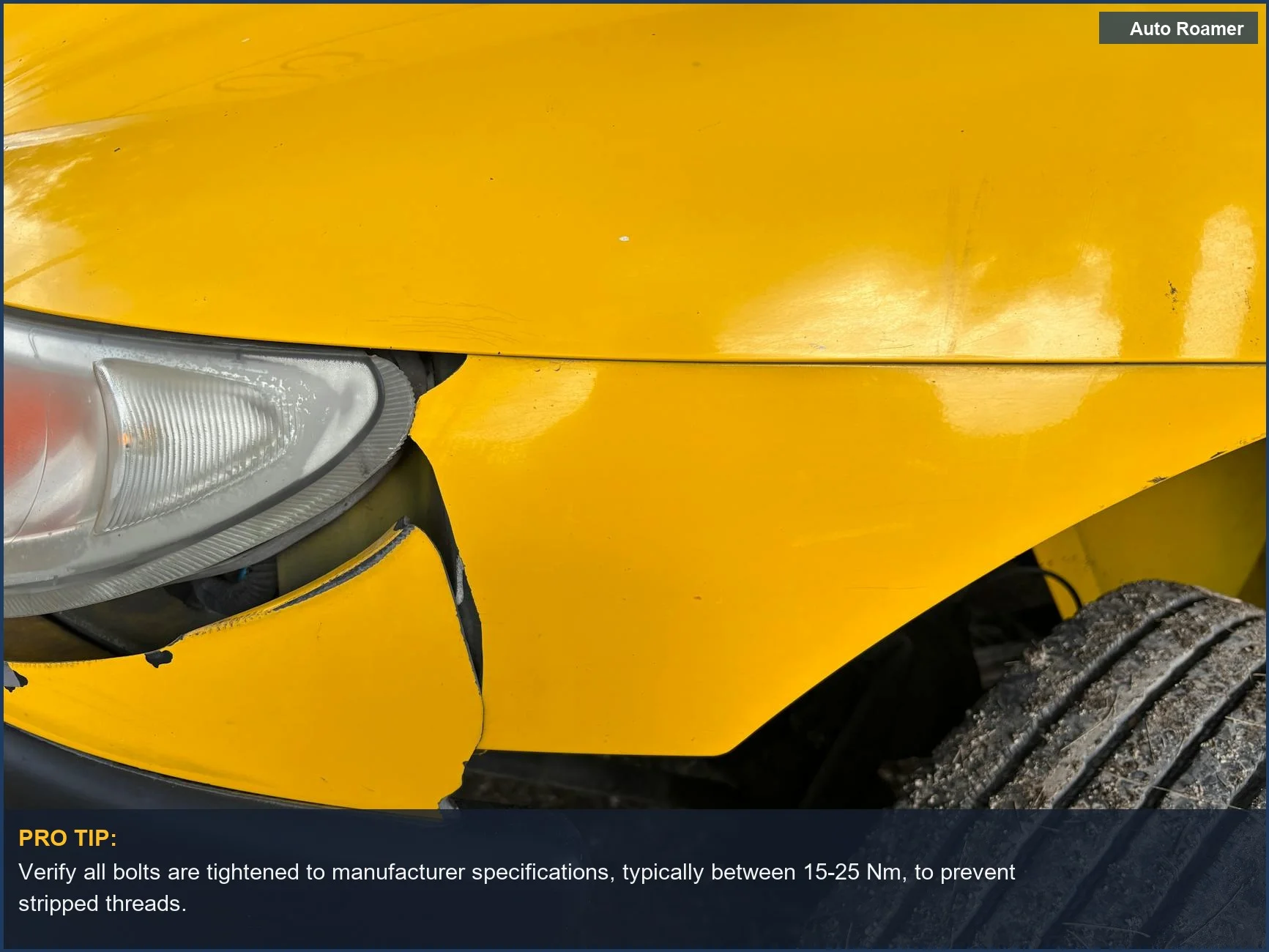 Close-up of a yellow car's front bumper and headlight, damaged from an accident potentially linked to roof rack failure.