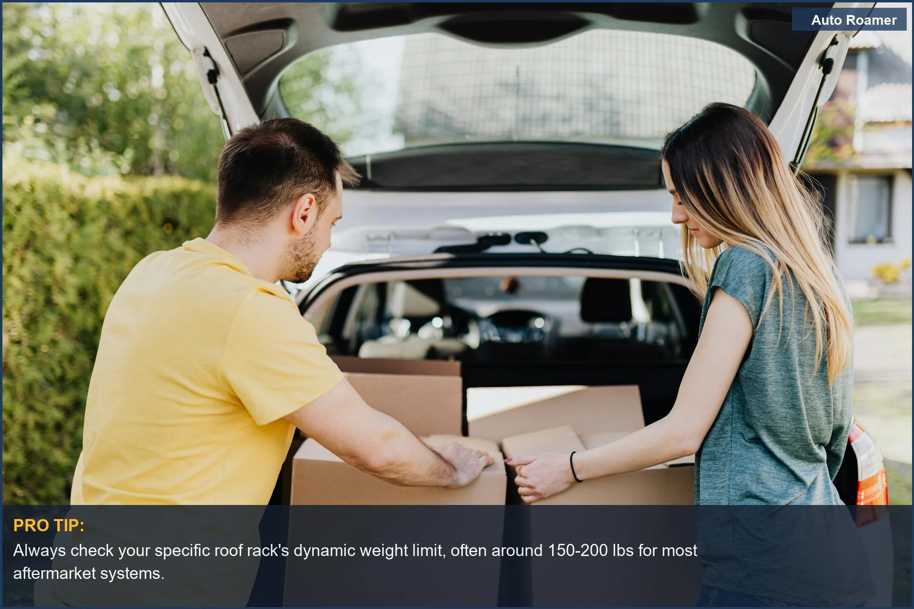 Couple loading moving boxes into a car trunk, understanding roof rack weight limit is crucial for safe transport.