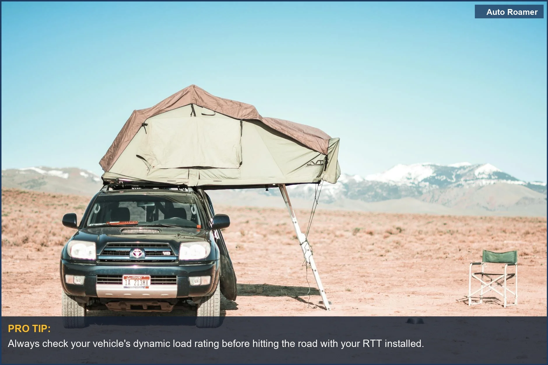 SUV with a rooftop tent parked in a desert landscape, highlighting SUV roof load limit.