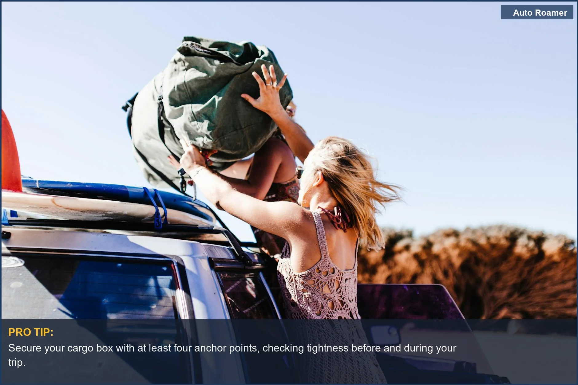 Woman securing a large bag onto a car roof rack for a summer road trip adventure and safe travel.