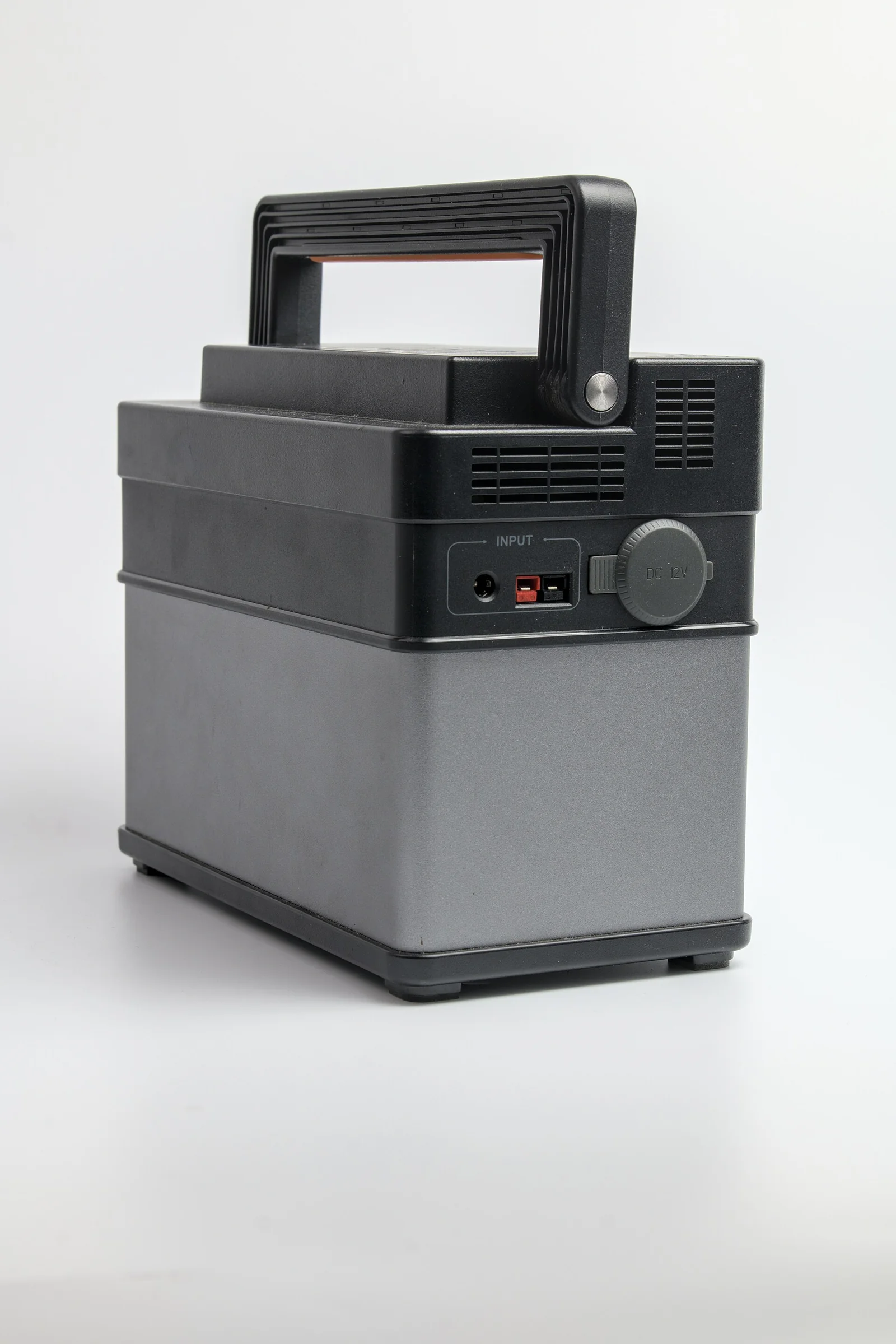 Portable power station with a carry handle and AC outlets