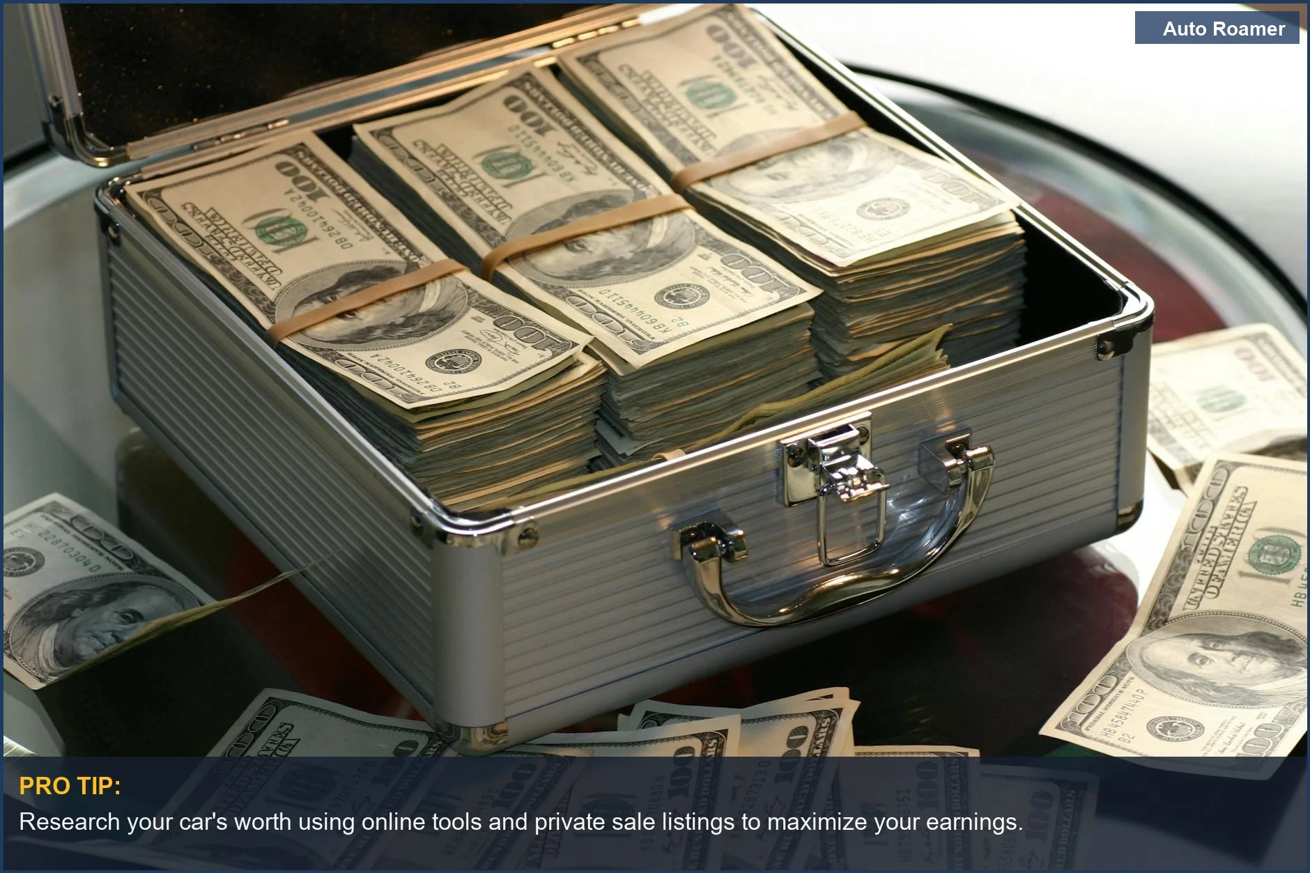 Open briefcase filled with stacks of hundred dollar bills on a glass table, symbolizing the potential profit from selling your car privately.