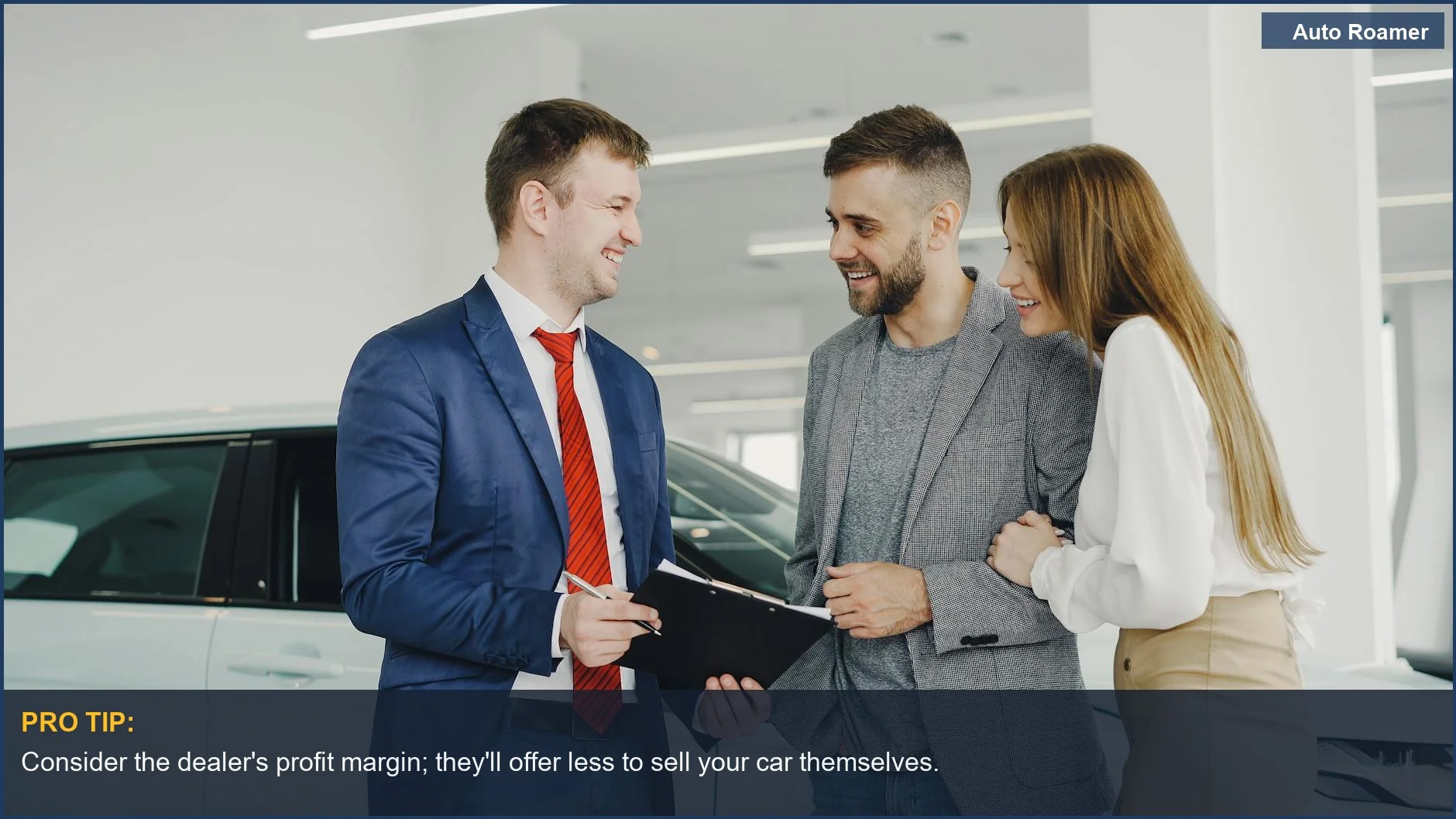 Smiling couple buys a new car from a salesman at a modern dealership, highlighting the ease of a car trade-in.