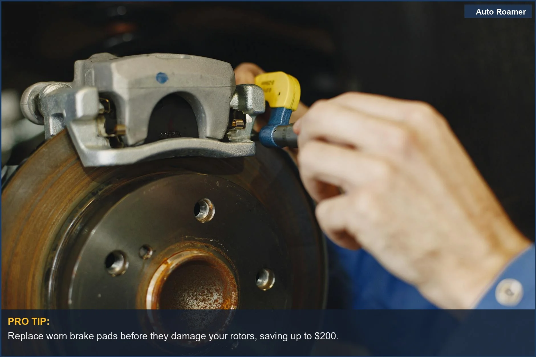 Mechanic inspecting a car's disc brake for wear, a common maintenance task.
