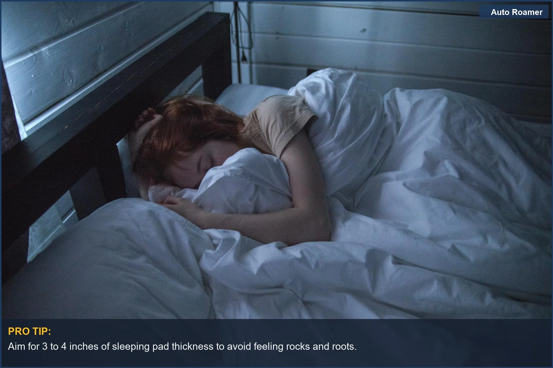 Peaceful woman sleeping on a soft mattress, ideal for car camping.