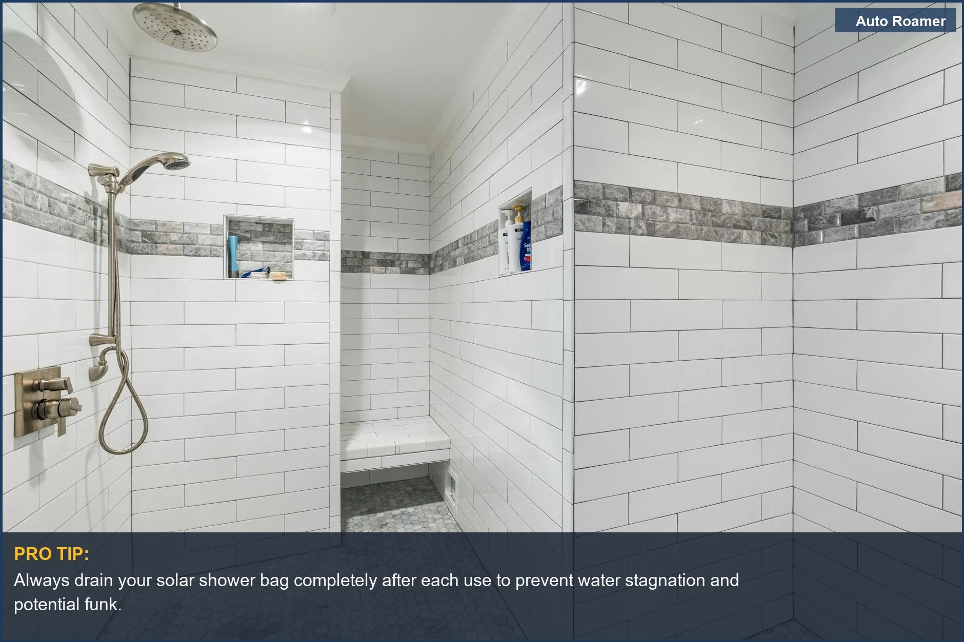 White tiled walk-in shower with modern fixtures, essential for understanding solar shower care best practices.