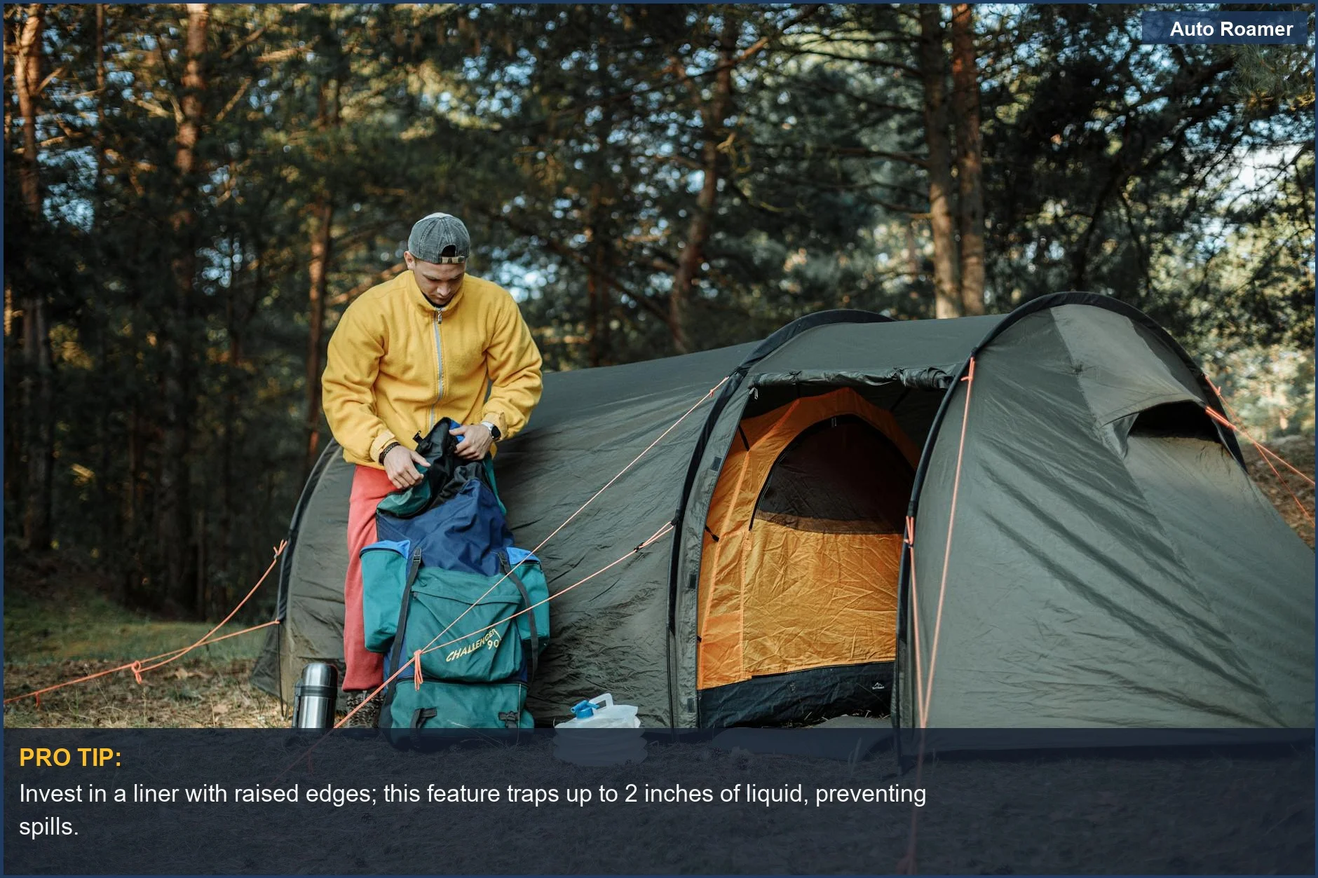 Man arranging camping equipment near a tent in a forest, highlighting the importance of SUV cargo liner material.