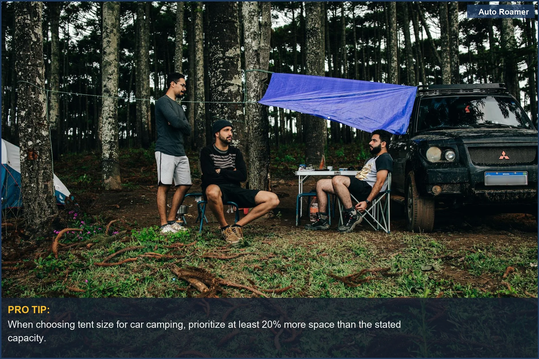 Men enjoy forest car camping with an SUV and a comfortable tent.