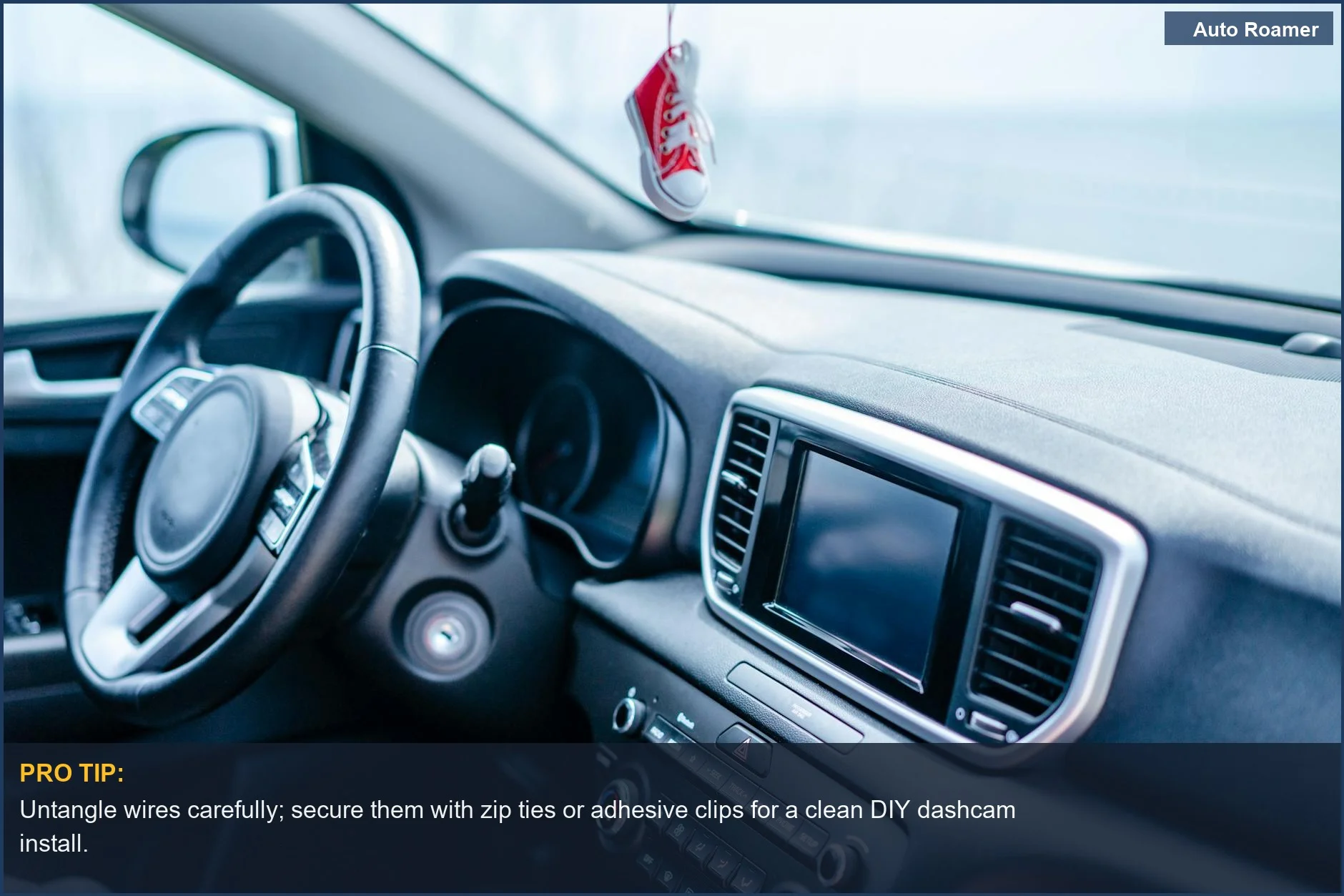 Tesla Model 3 steering wheel and dashboard interior, highlighting DIY dashcam installation challenges.
