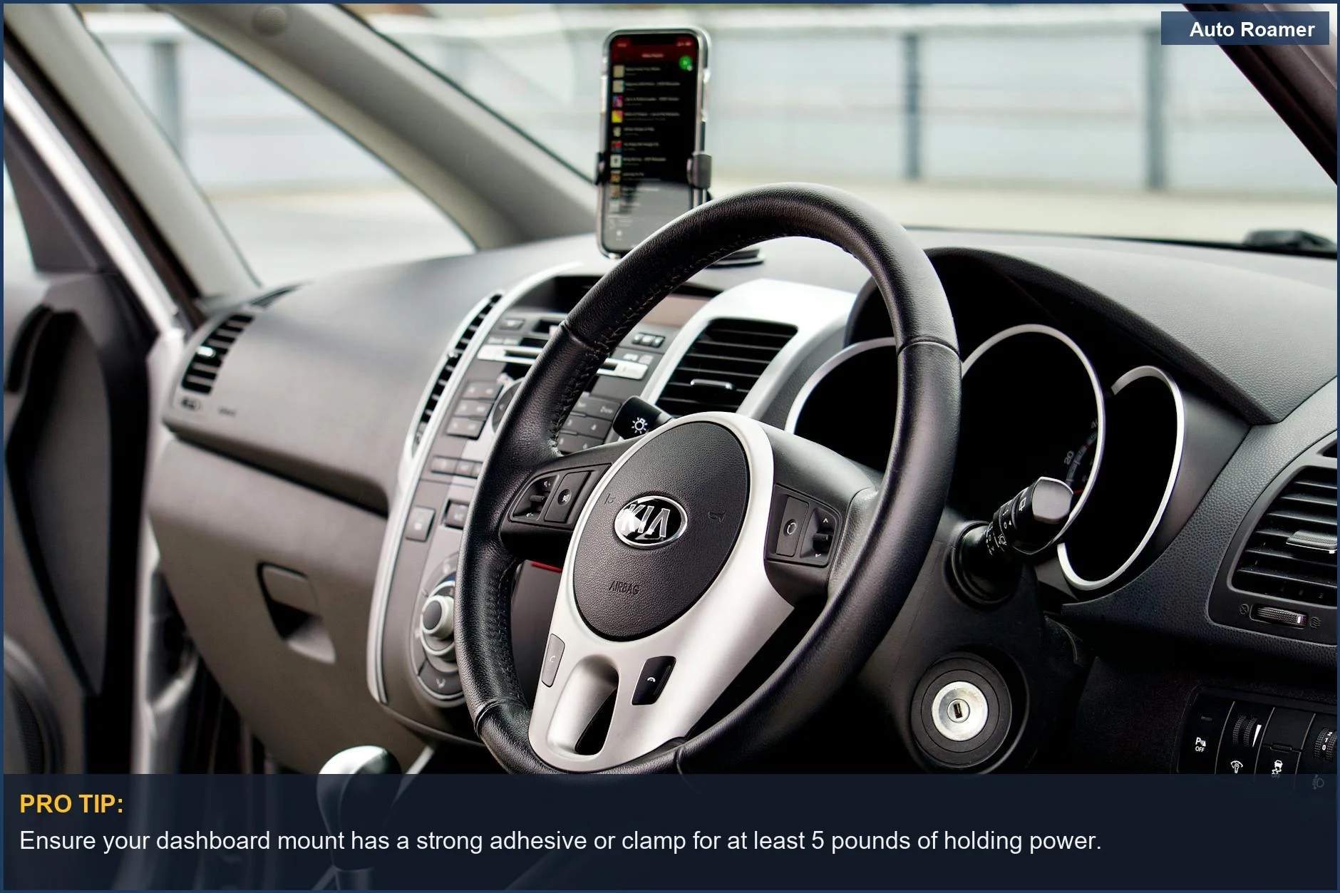 Tesla Model 3 dashboard mount securely holding a smartphone for easy navigation access.