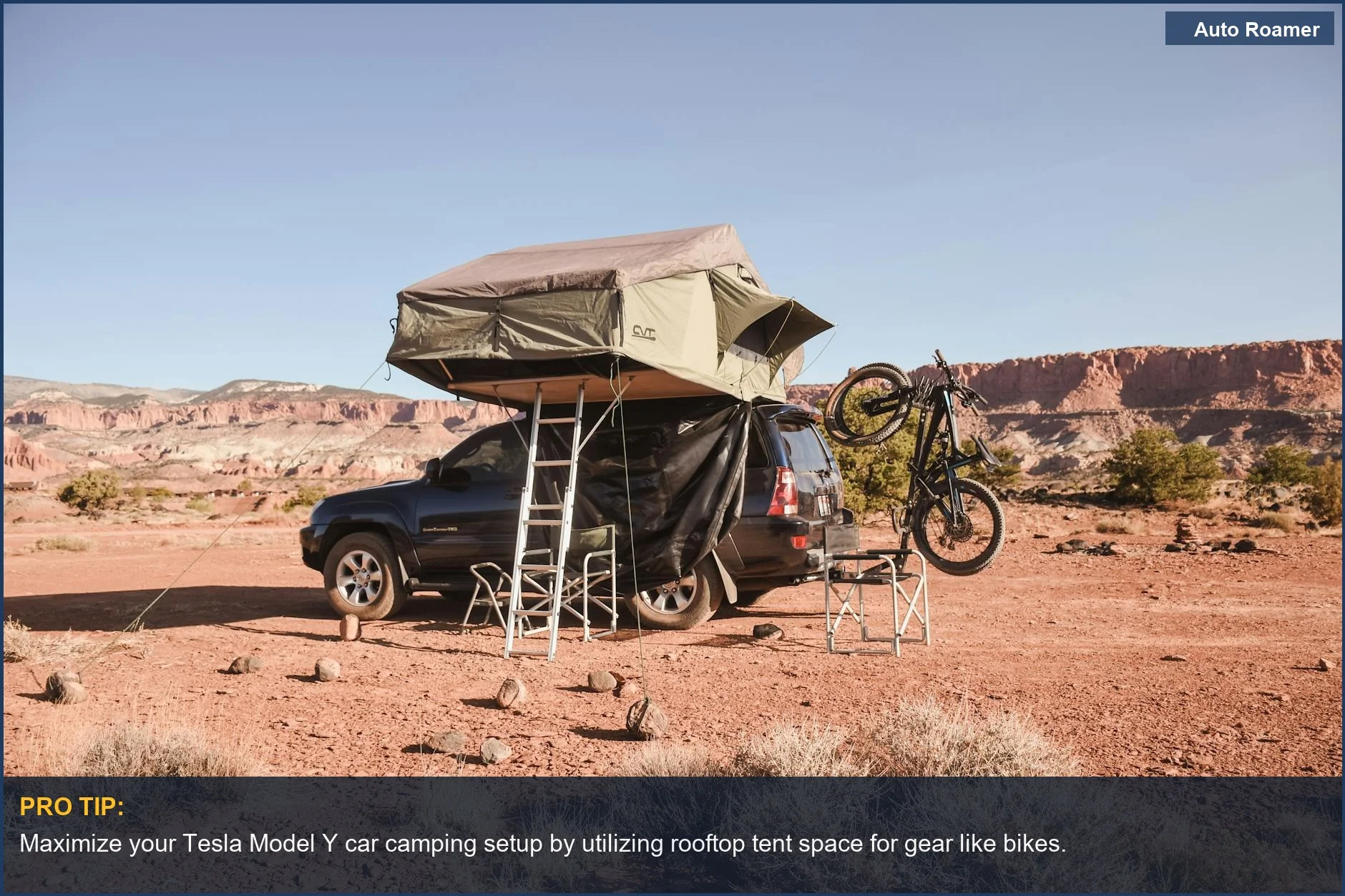 Tesla Model Y rooftop tent setup for desert car camping adventure with mountain bike.