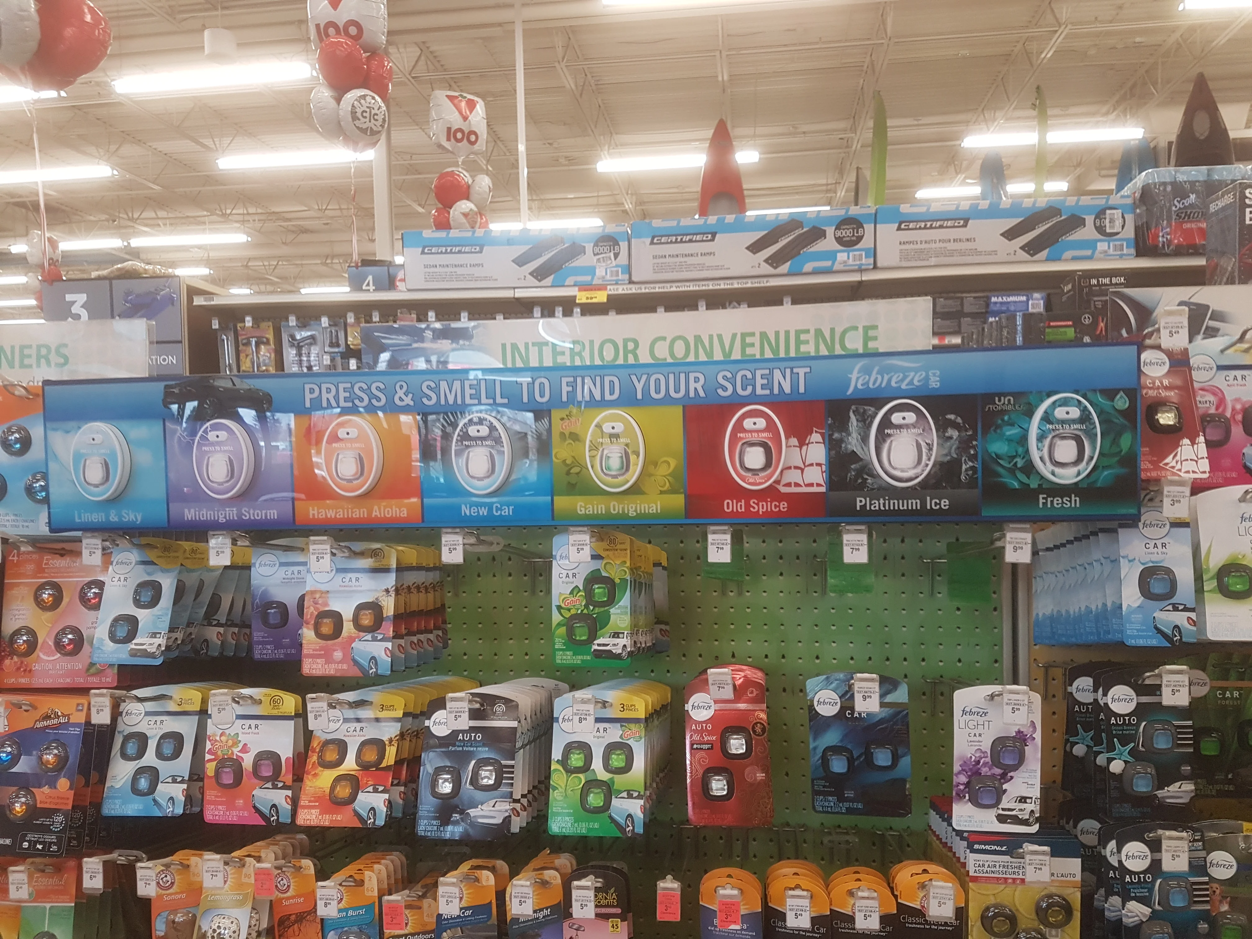 A retail rack of disposable car air fresheners, the throwaway products whose environmental cost this article examines.