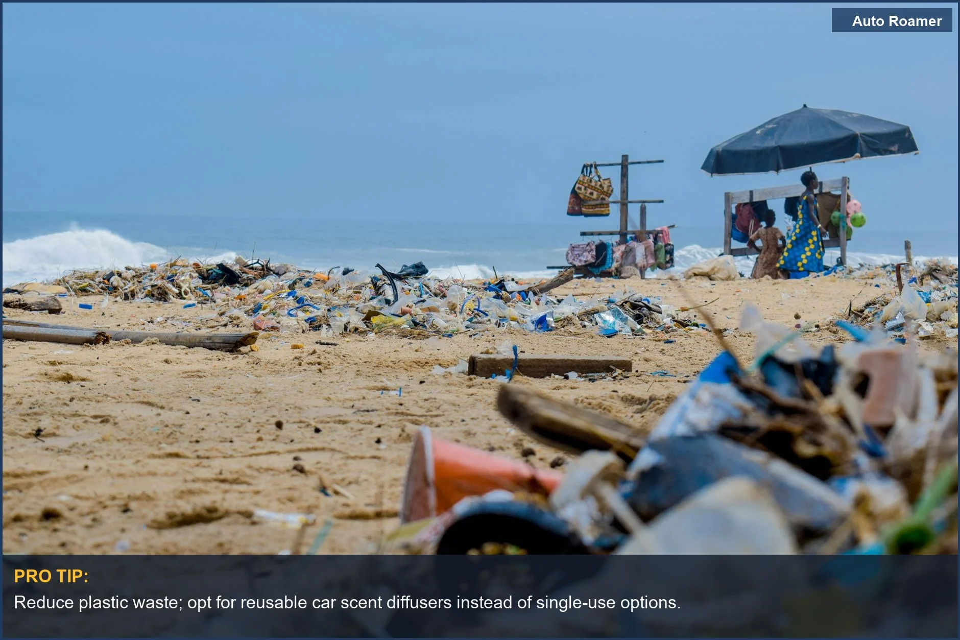 Ocean pollution from disposable car air fresheners littering a sandy beach.