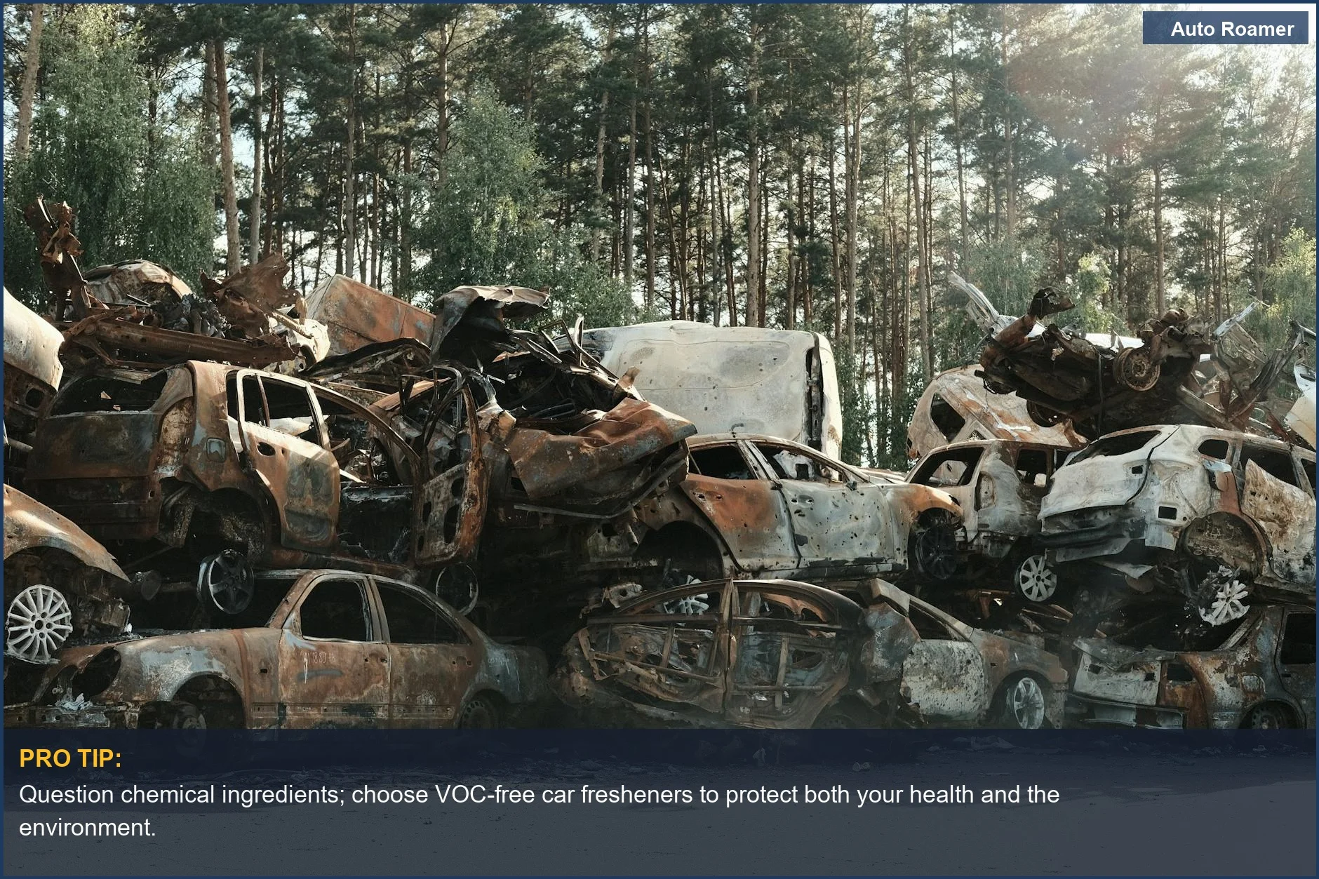 Abandoned, rusted cars in a forest junkyard, a symbol of automotive waste and decay.