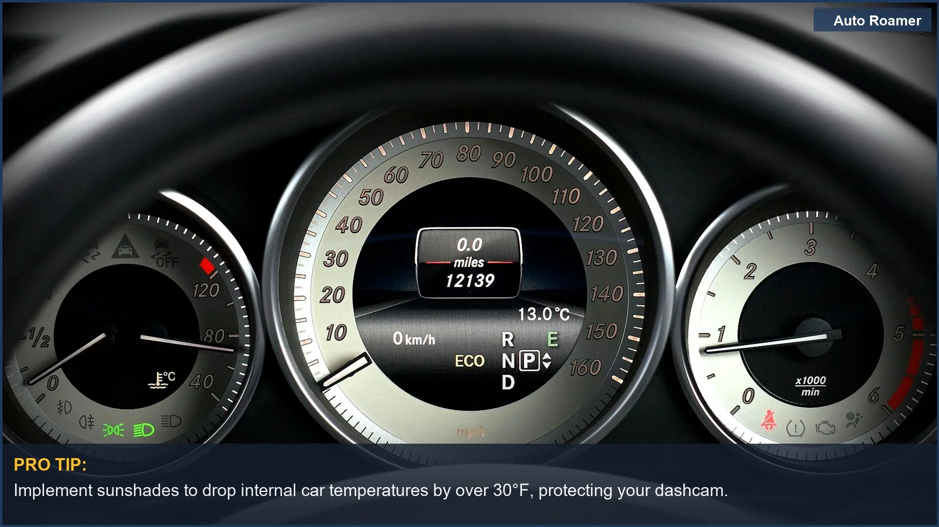 Speedometer and odometer on a car dashboard, demonstrating how sunshades protect dashcam from heat damage.