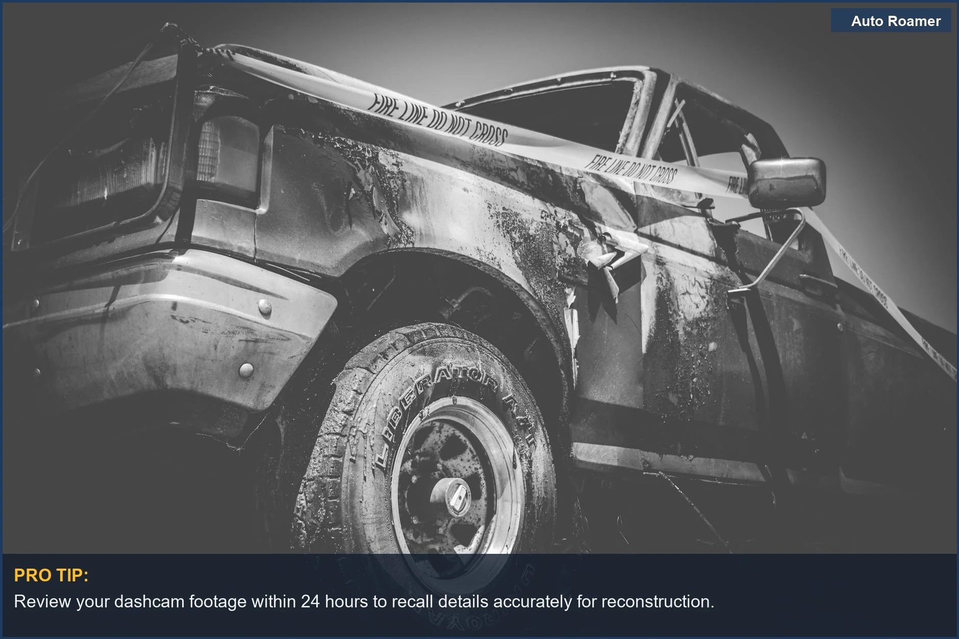 Dramatic black and white photo of a damaged truck behind police tape, a common scene where dashcam evidence is vital.