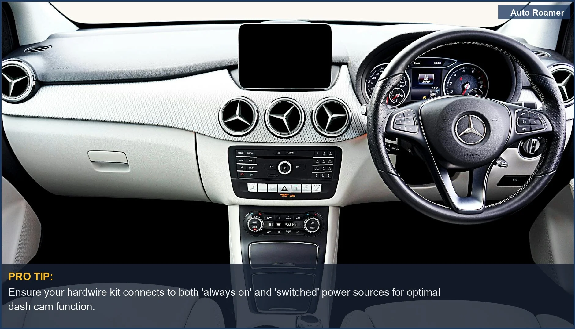 Modern Mercedes-Benz car interior dashboard and steering wheel, ideal for hardwiring a dash cam.