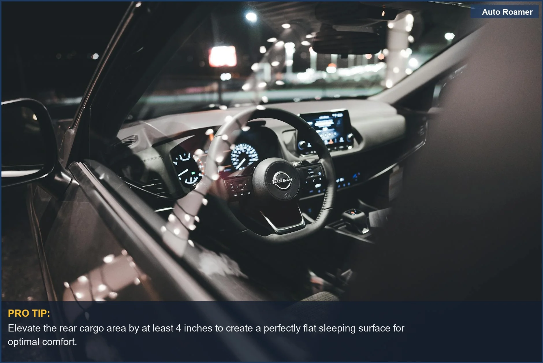 VW Tiguan car camping sleeping setup with illuminated dashboard and steering wheel at night.