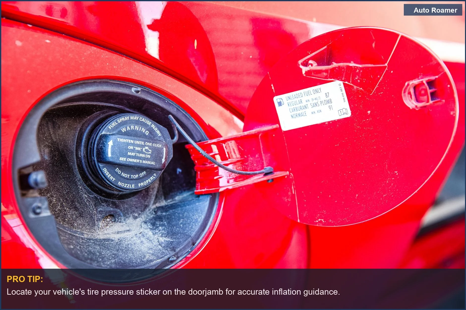 Close-up of a car's fuel cap with warning labels, reminding drivers about tire pressure.