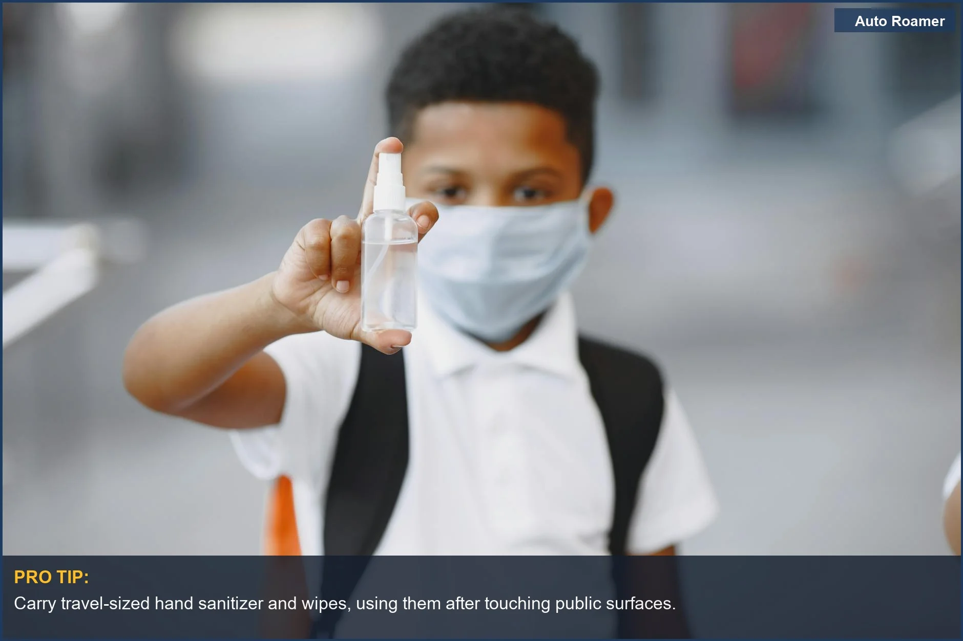 Young boy practices hygiene with hand sanitizer, a key part of toddler travel safety measures.