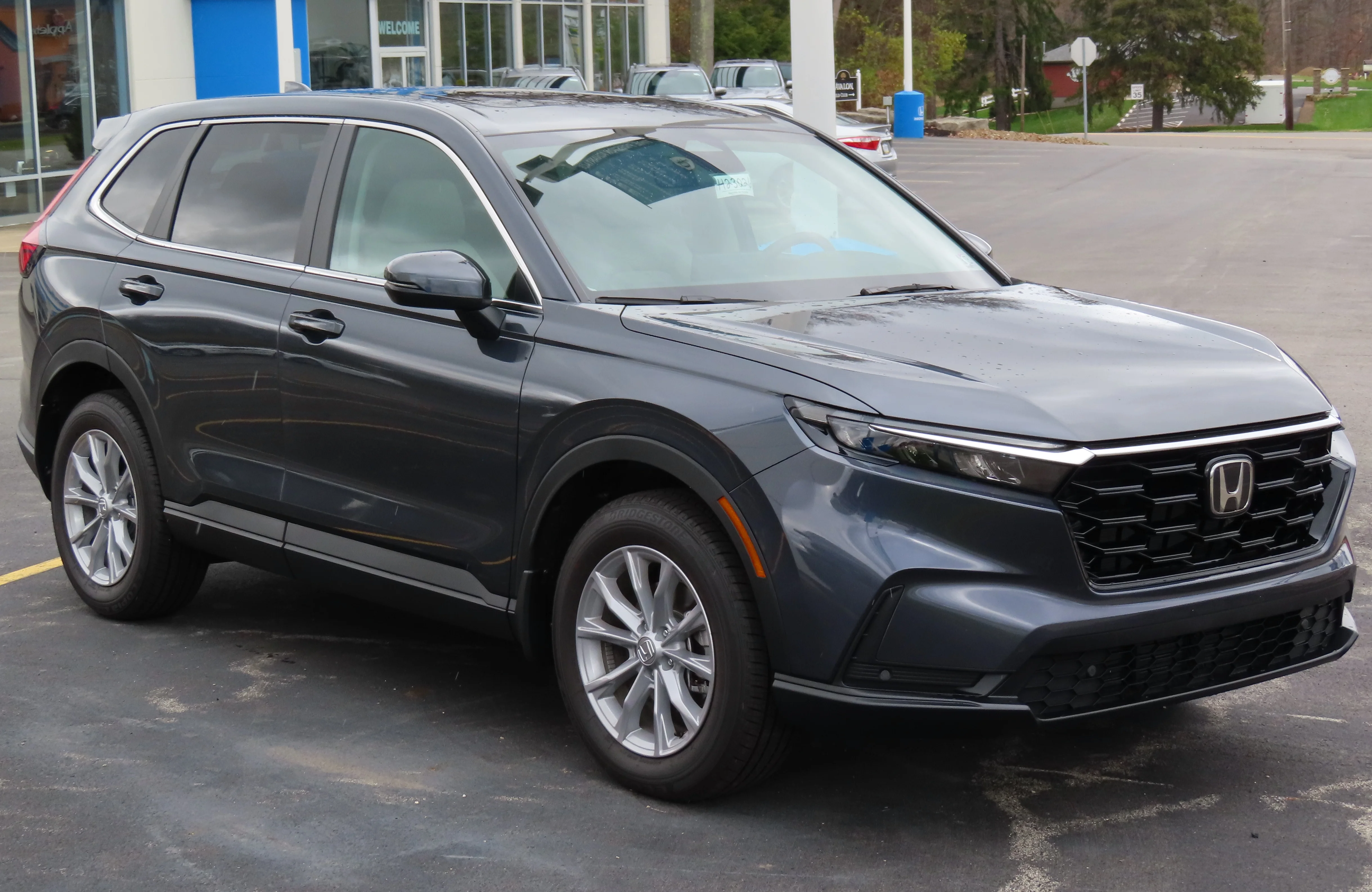 A 2023 Honda CR-V EX-L, the compact SUV this comparison pits against the RAV4 for sleeping in the back.