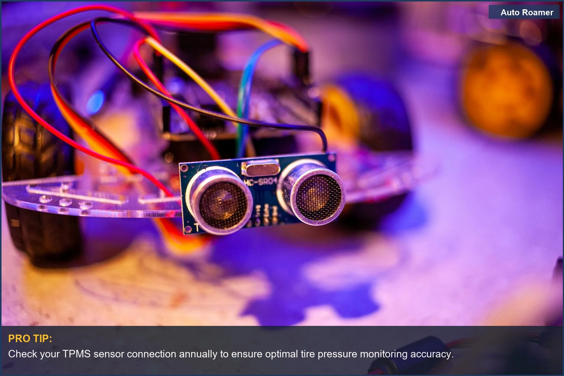 Close-up of a TPMS sensor and wiring, showing the technology behind tire pressure monitoring.