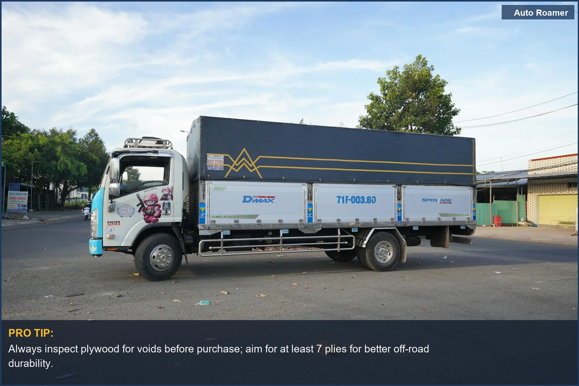 White delivery truck on city street, showcasing common truck bed storage solutions.