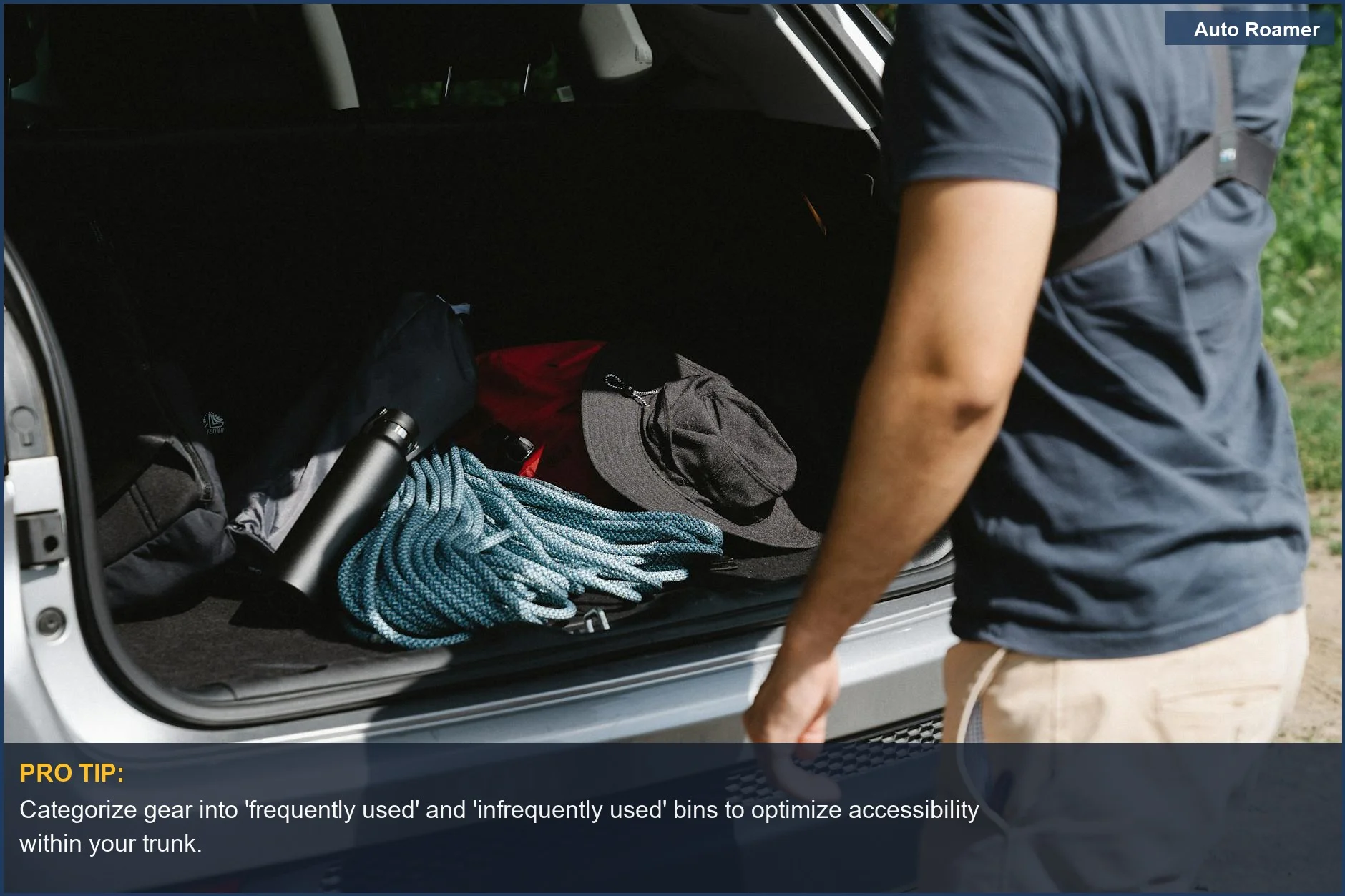 Man organizing camping gear in car trunk, preparing for adventure and sports bags.