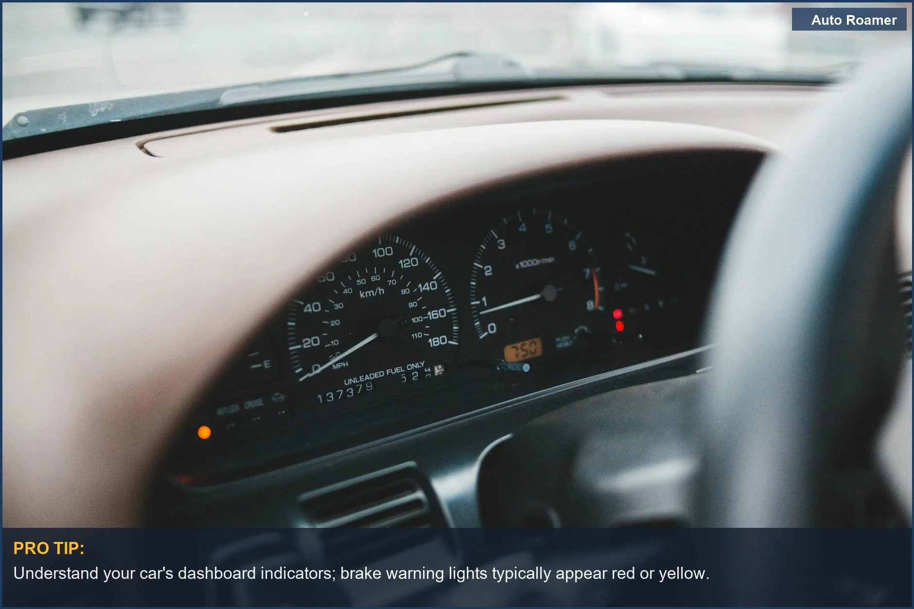 Modern car dashboard with glowing indicators and a soft-focus control panel, highlighting car braking systems.