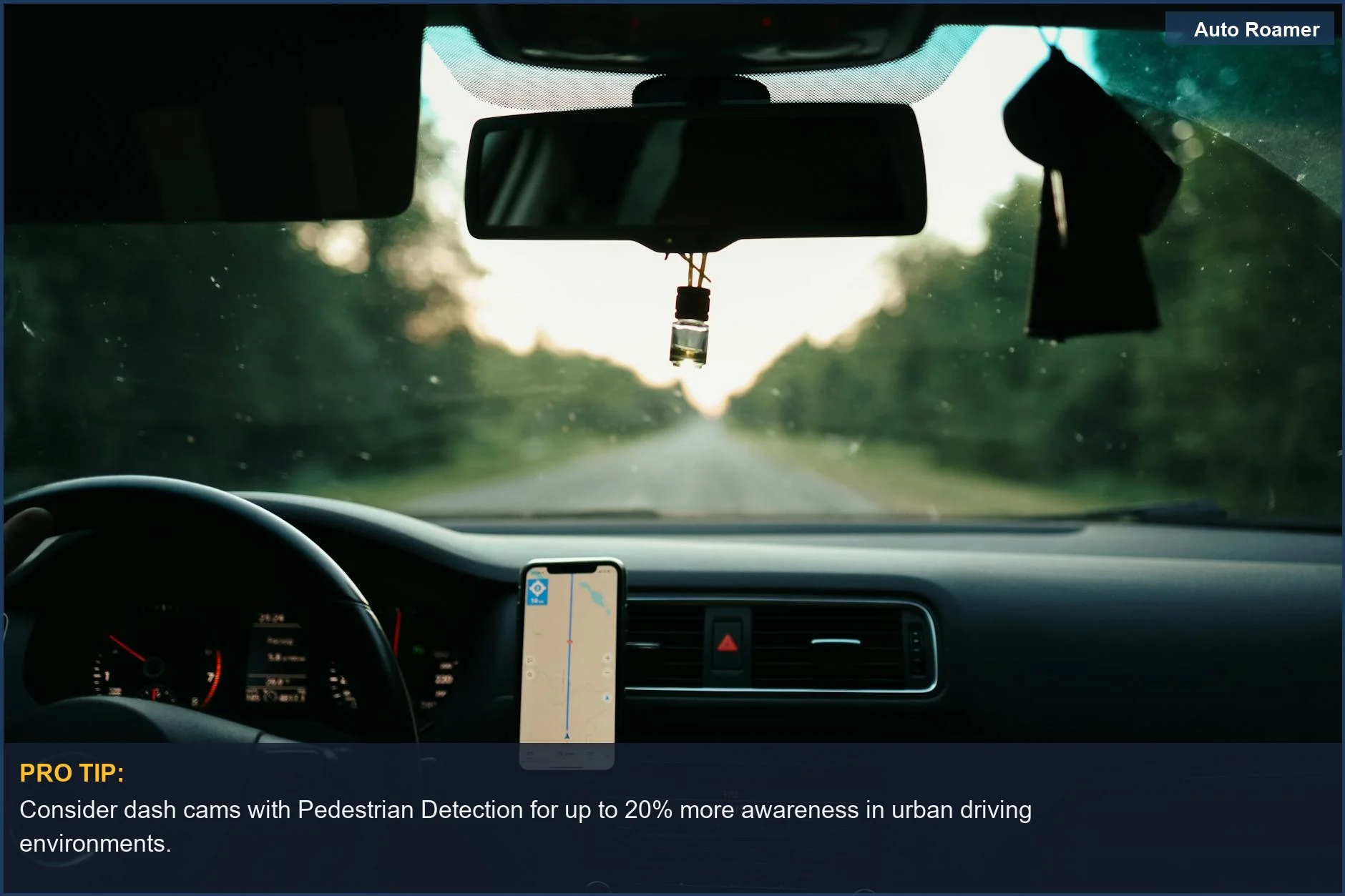 Scenic road view from a car interior with GPS, illustrating ADAS dash cam integration.