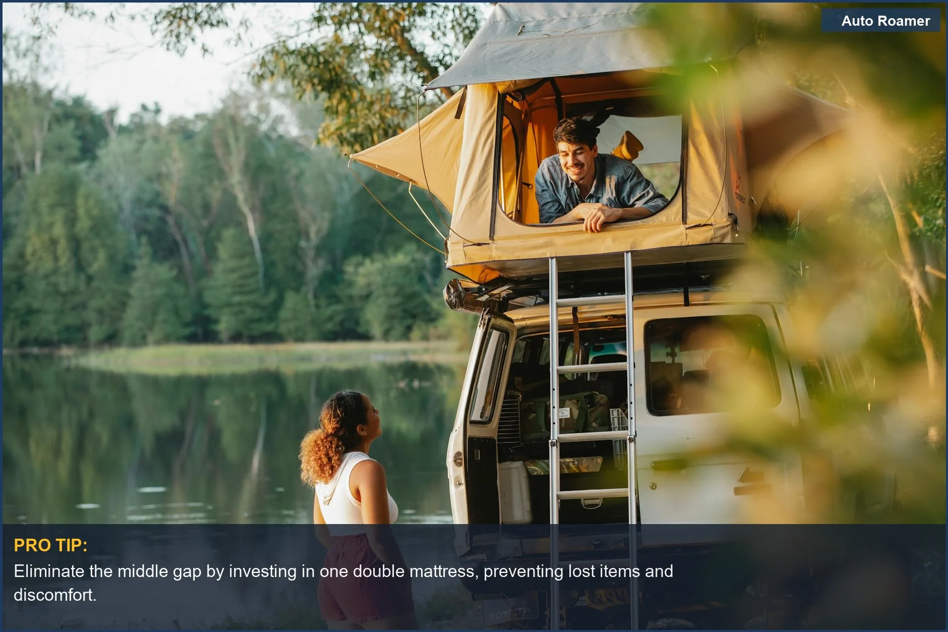 Rooftop tent couple camping by lake, demonstrating the benefits of a unified car camping mattress vs. two singles.