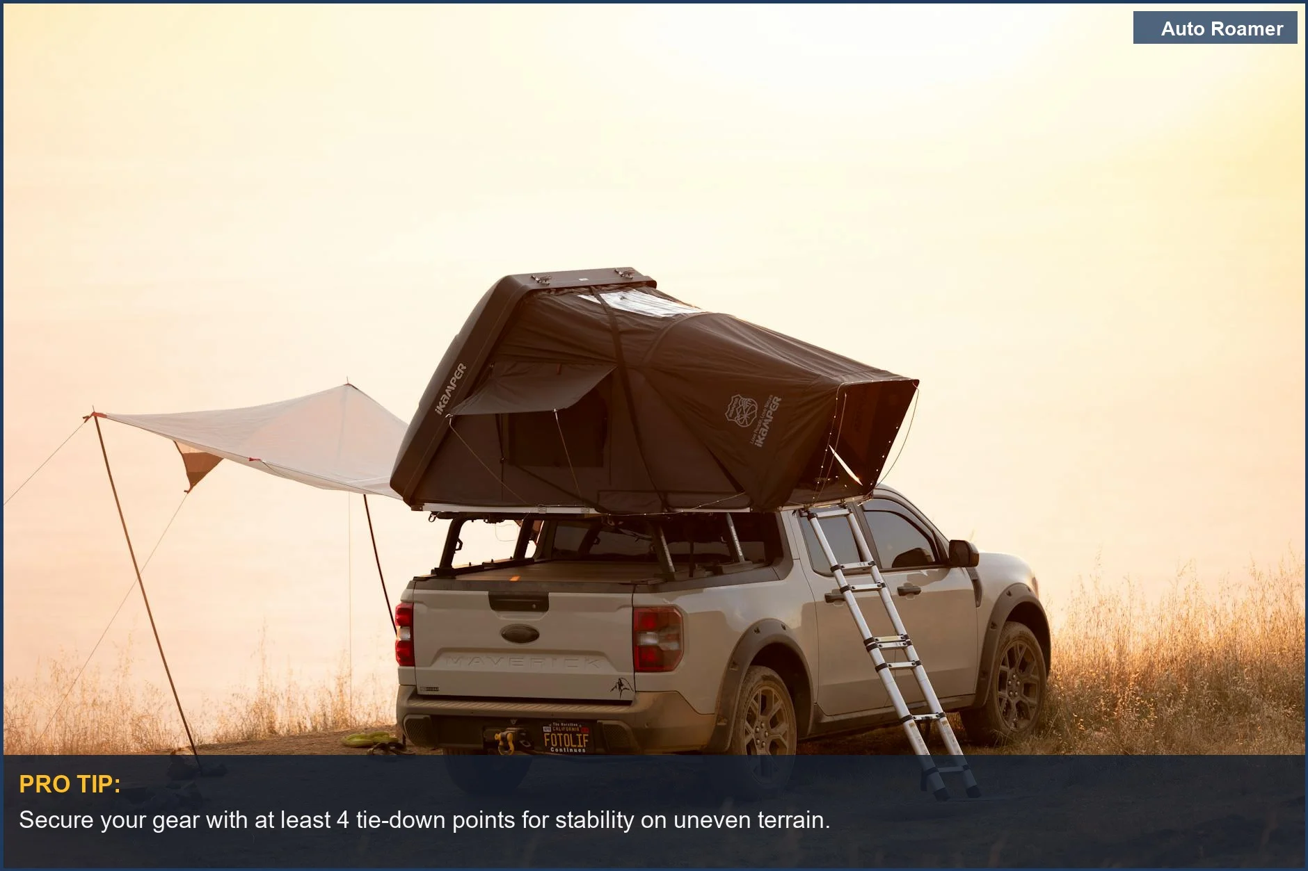 Sunset over a pickup truck with a rooftop tent, showcasing ideal camper shell options for camping.