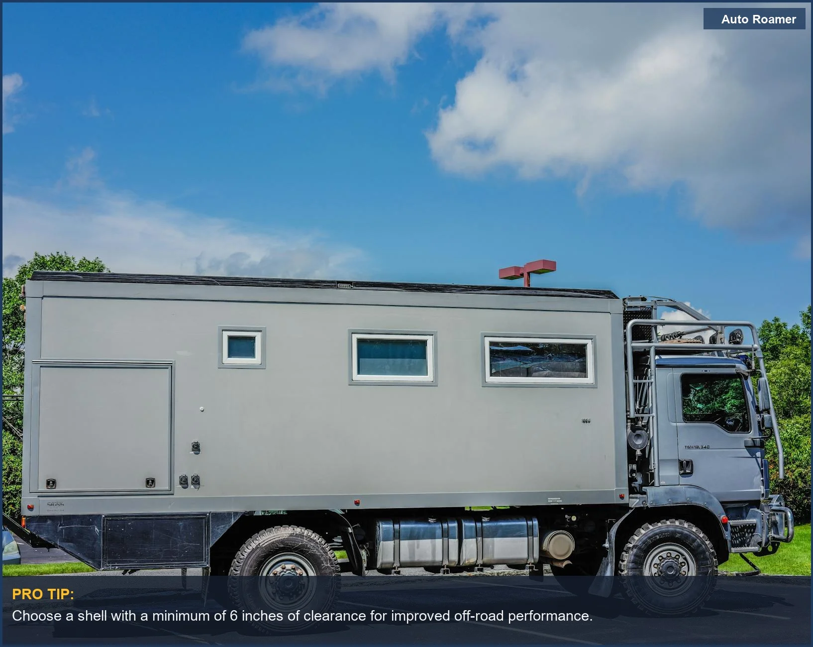 Rugged expedition vehicle parked outdoors, illustrating robust camper shell options for off-road exploration.