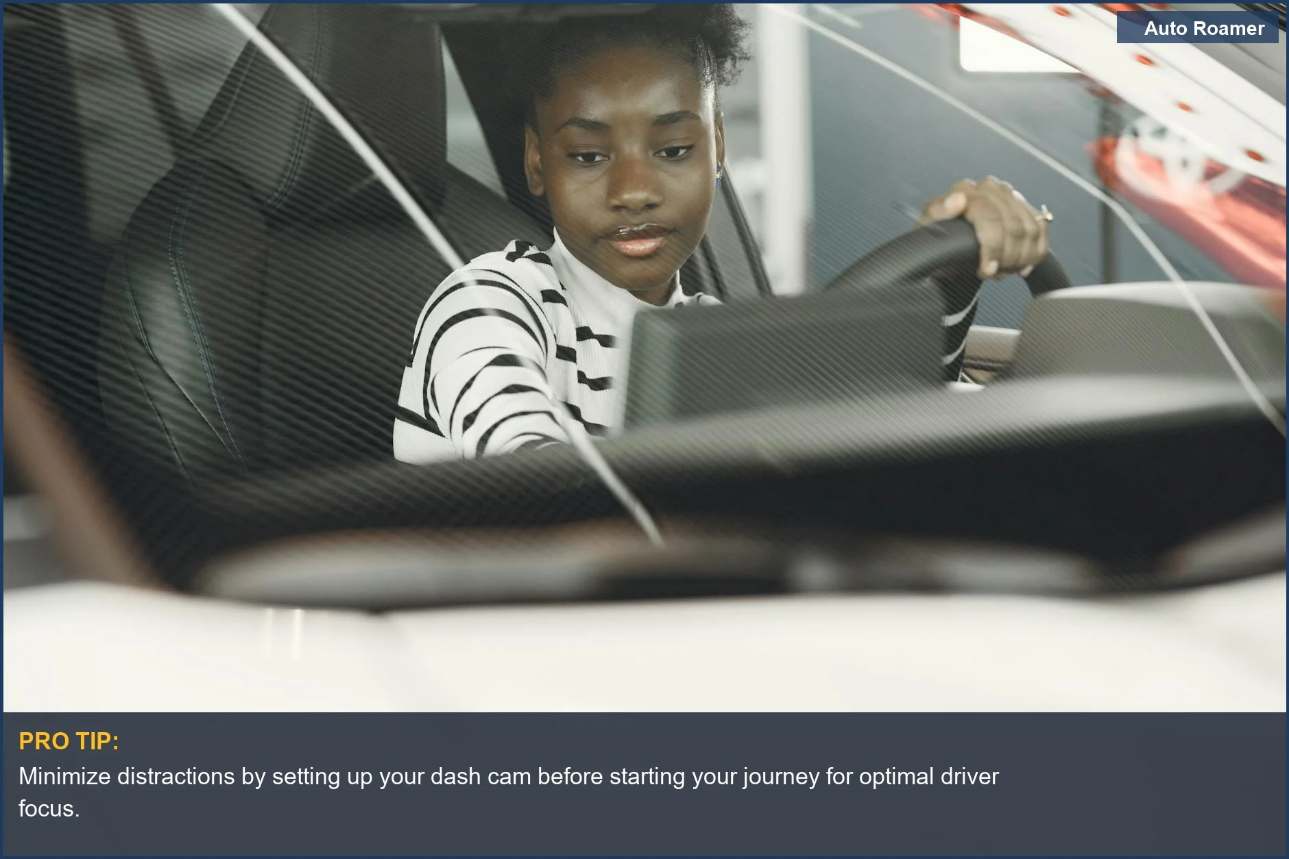 Woman driving a car interior, emphasizing steering wheel and driver's focus on the road ahead.
