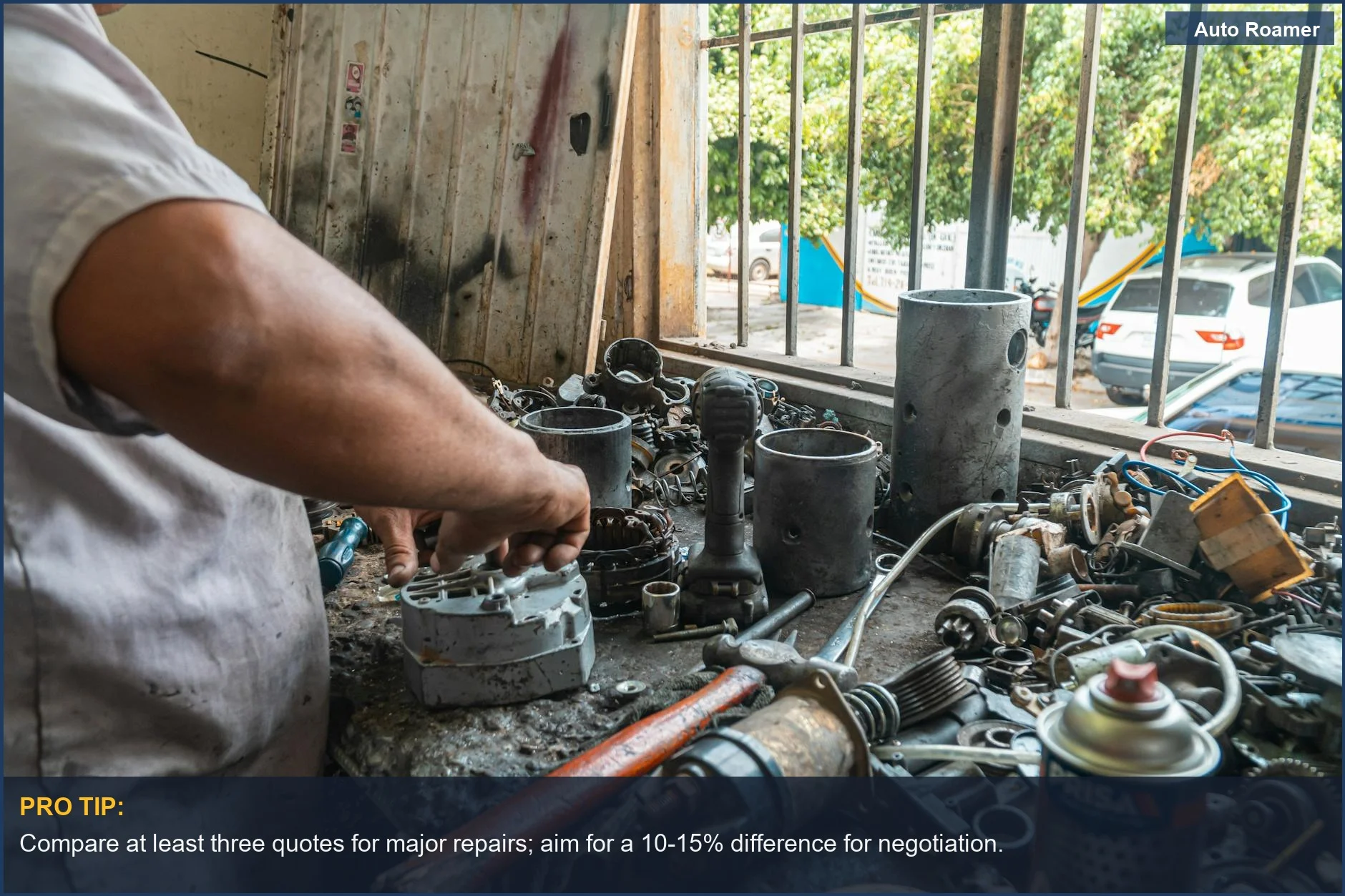 Mechanic organizing auto parts in a workshop, highlighting the importance of fair car repair costs.