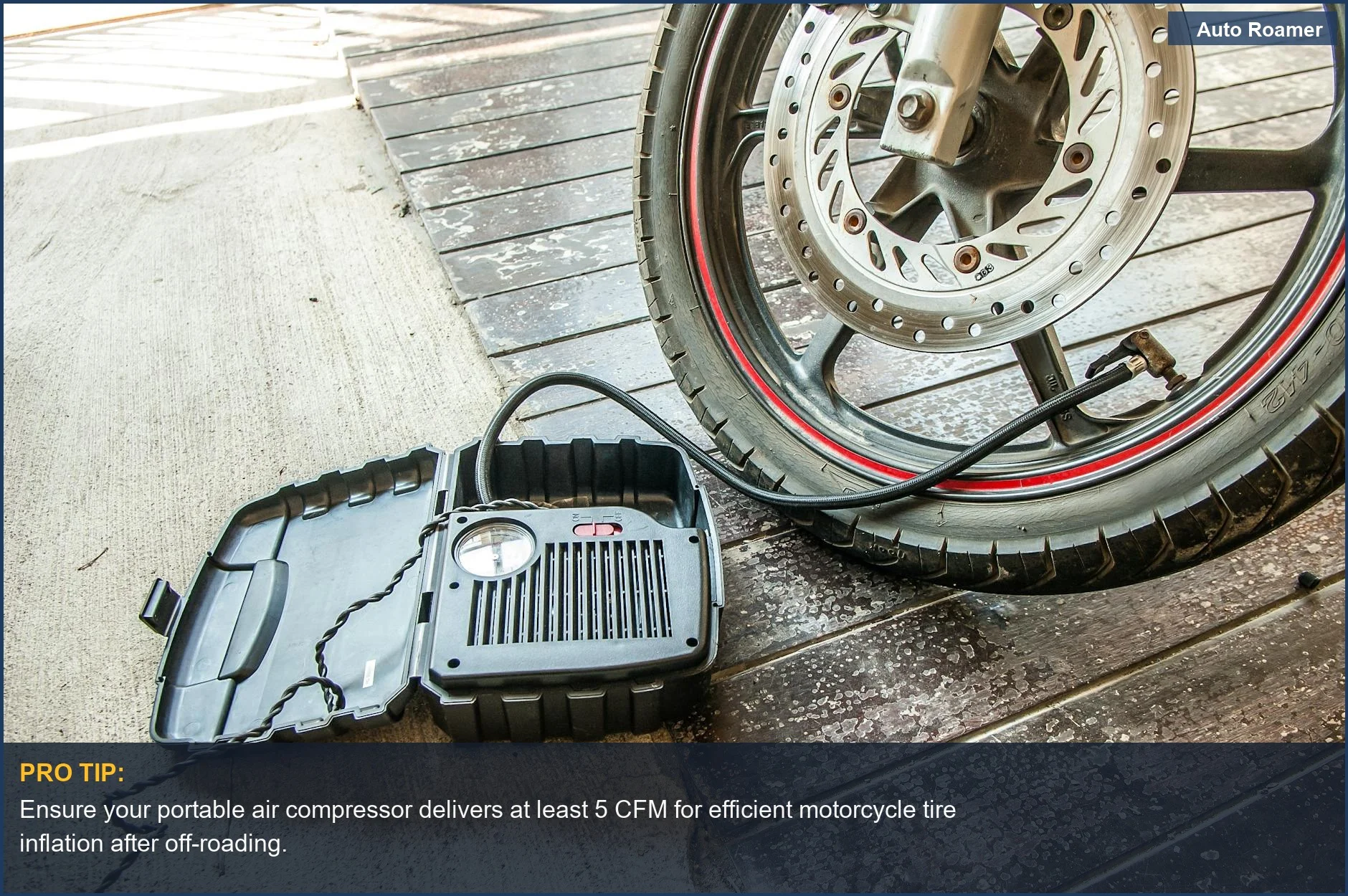 Motorcycle tire getting air from a portable compressor, illustrating air flow rate for quick inflation.