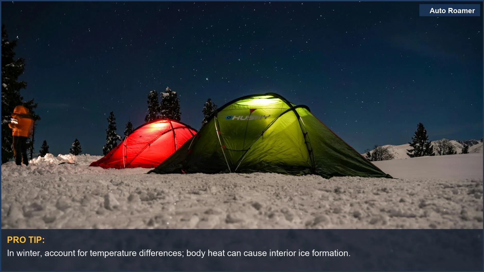Tents on snowy landscape at night, demonstrating winter condensation problems.