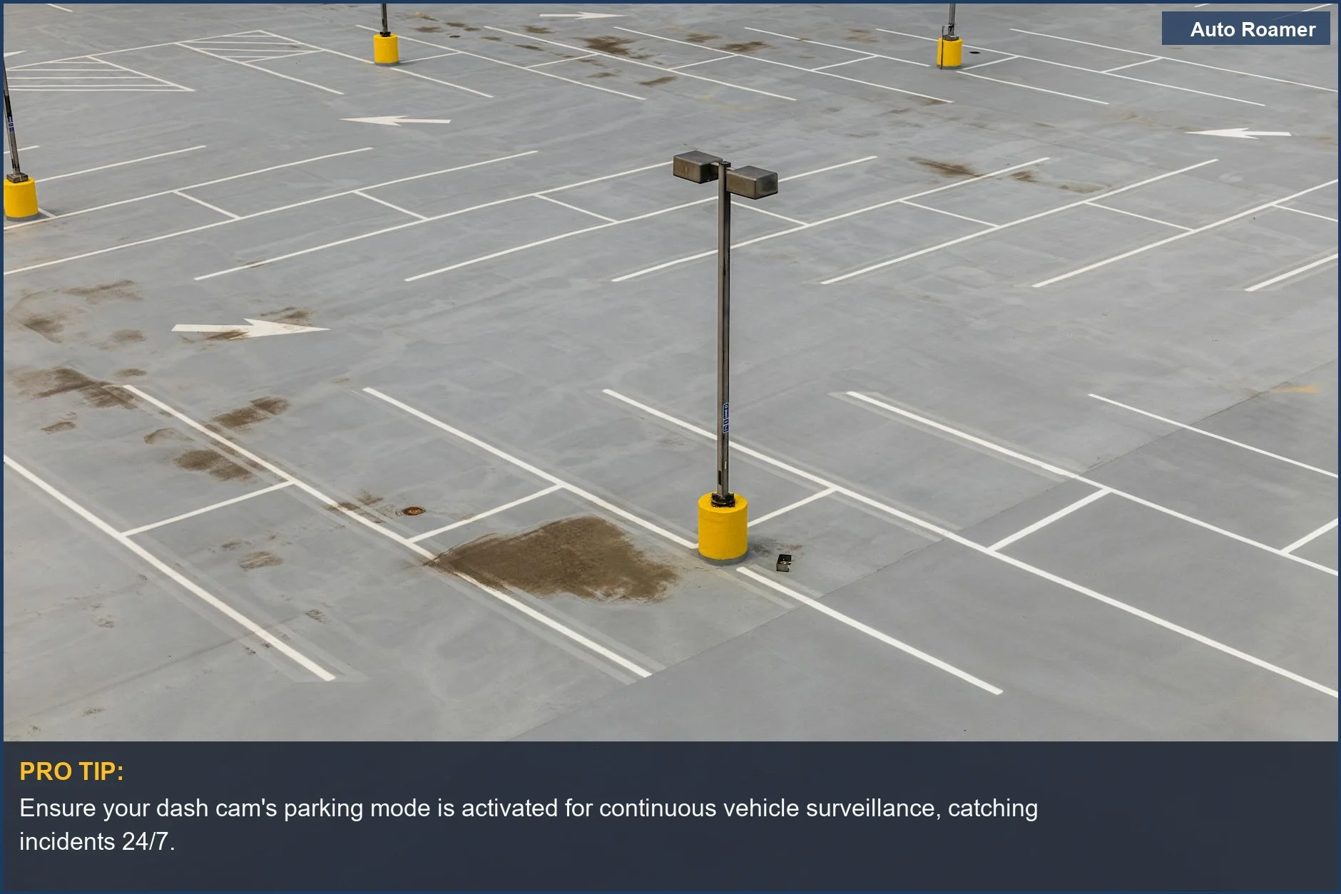 Empty parking lot with white lines and lamp posts, illustrating dash cam parking mode protection.