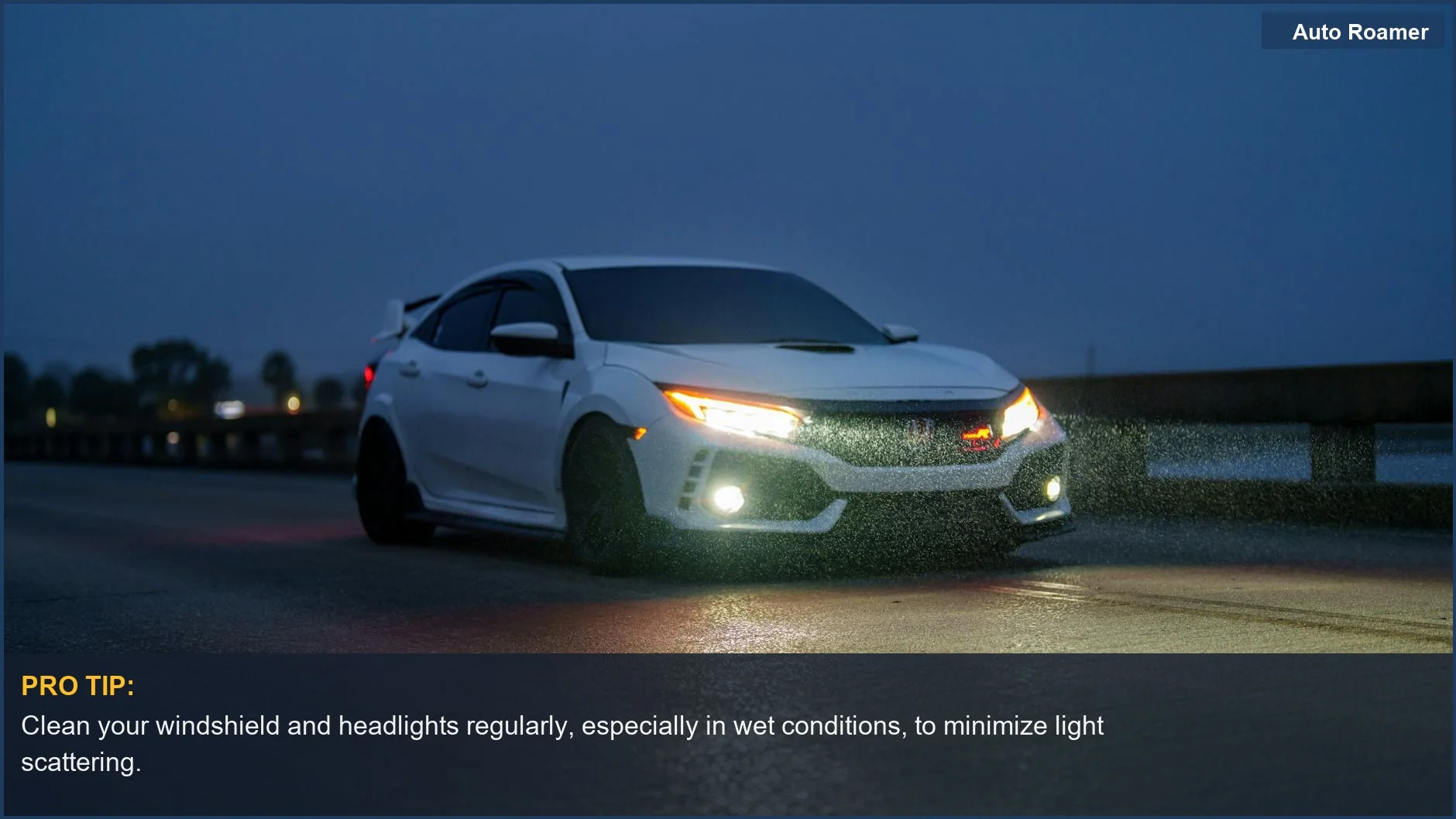 White sports car navigating a wet road at night, headlights piercing through rain.