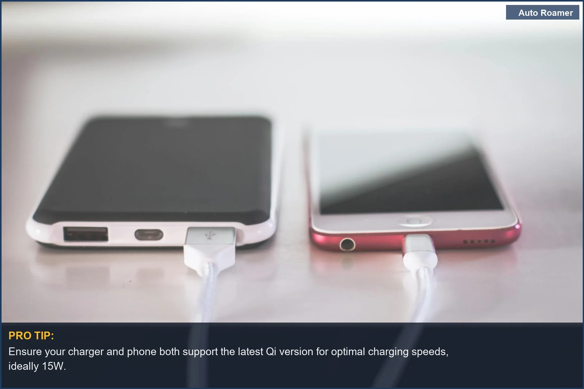 Two smartphones charging wirelessly on a desk, demonstrating modern phone charging technology.