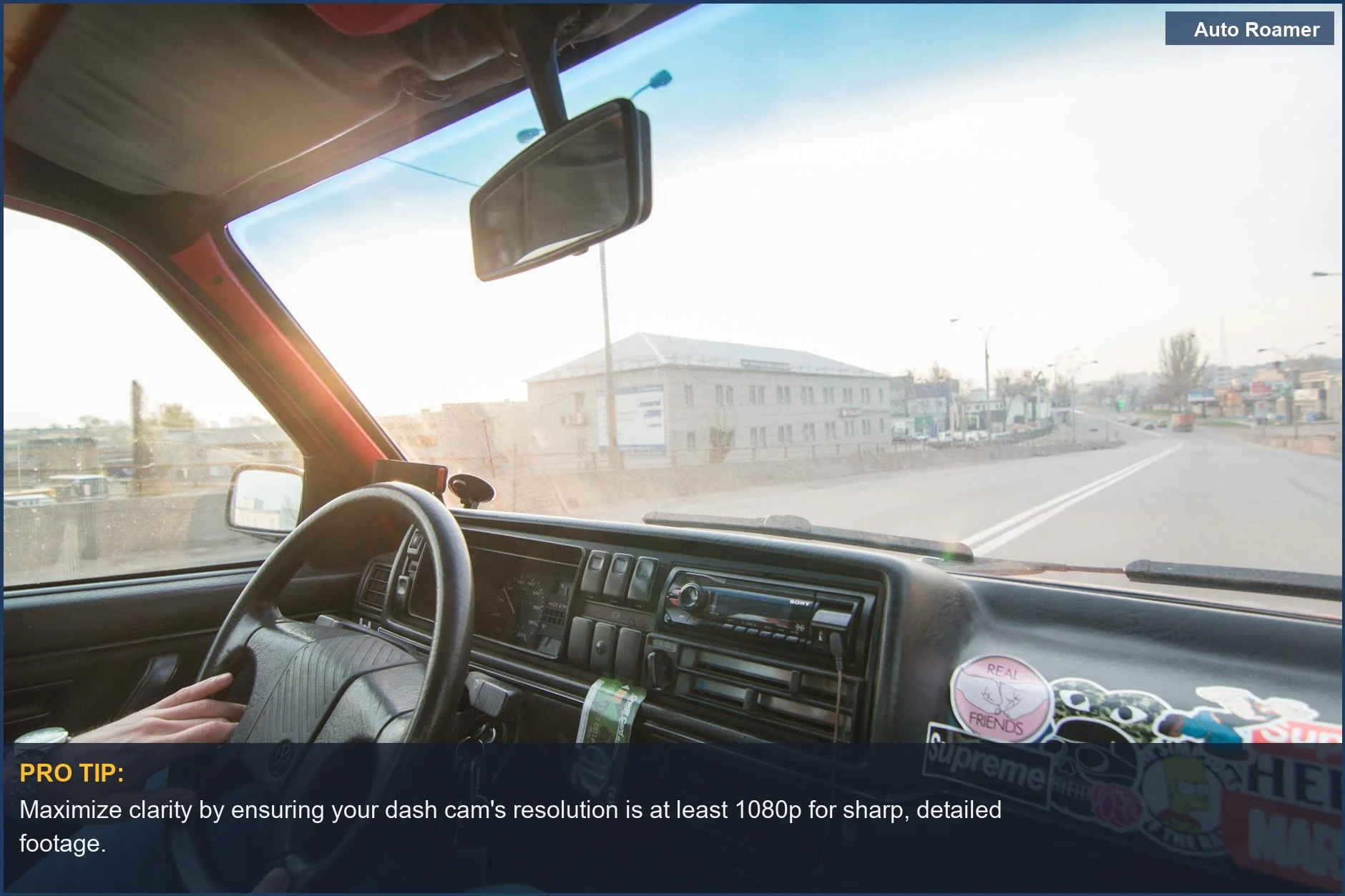 Sunny car interior with VIOFO dash cam capturing city view for clear video evidence.